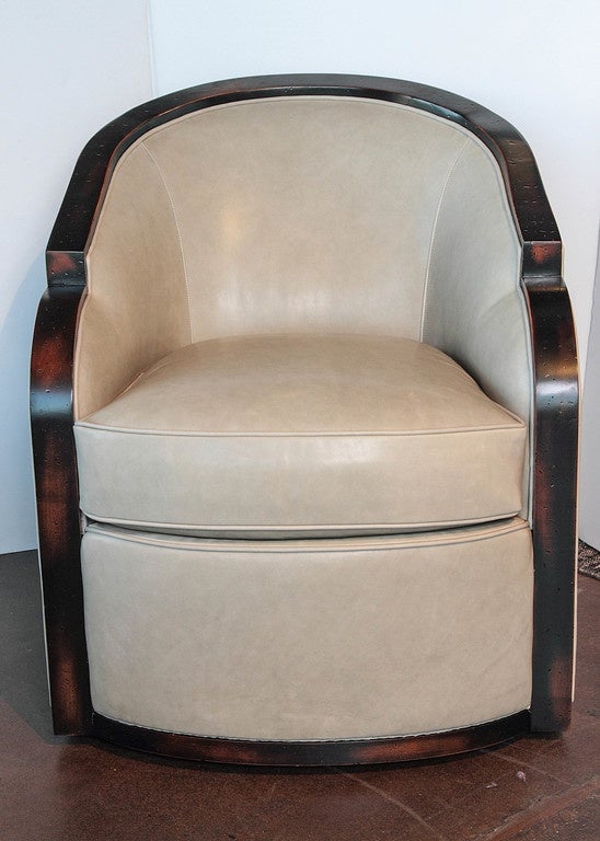 Leather Swivel Chair
Wesley Hall, Fabric: Amarillo Putty 
Finish: Merlot 
Comfort Down