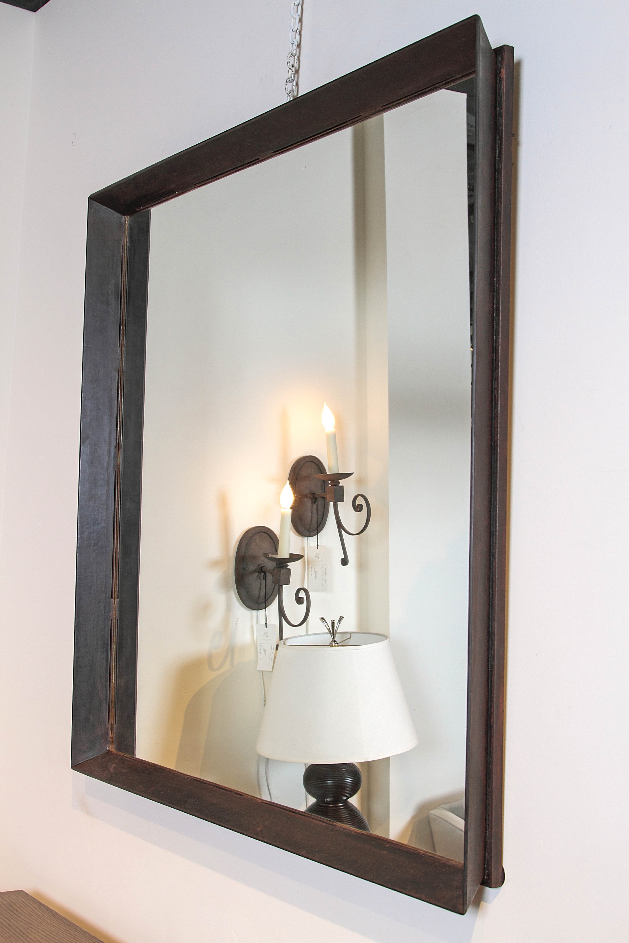 
Custom patinated steel wall mirror. 48 x 48
6-8 weeks production.