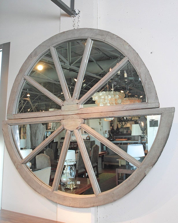 Antique Transom Window used as a mirror framed for a decorative wall mirror  
Original patina of Light grey beige of pine wood
From Normandy, France  Circa 1870
Demi Lune Transome Window up top: 37