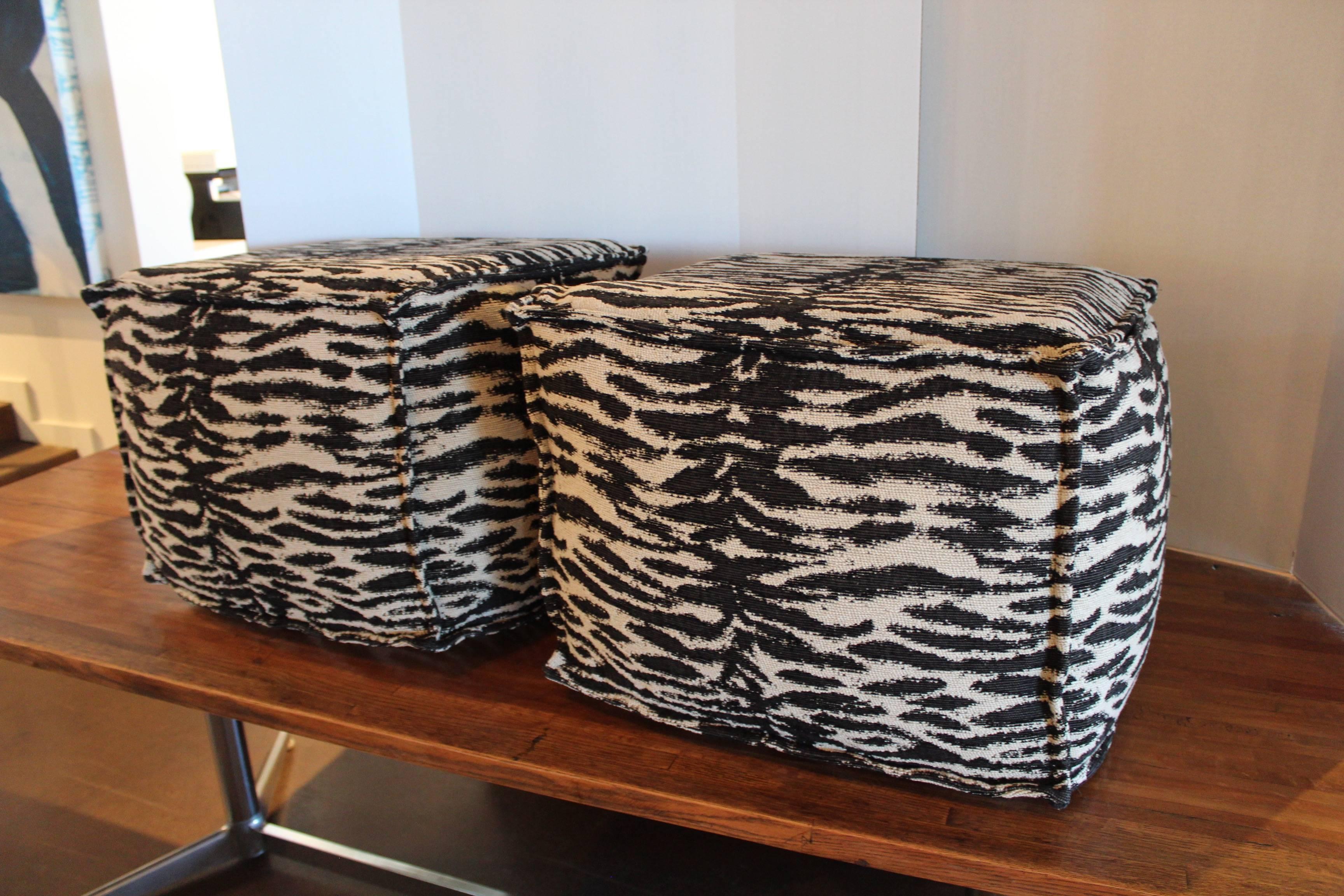 Zebra print ottomans.
Brand: Lee.
Fabric: Botswana Onyx.
Upholstery flanged.

Each ottoman is sold separately.
