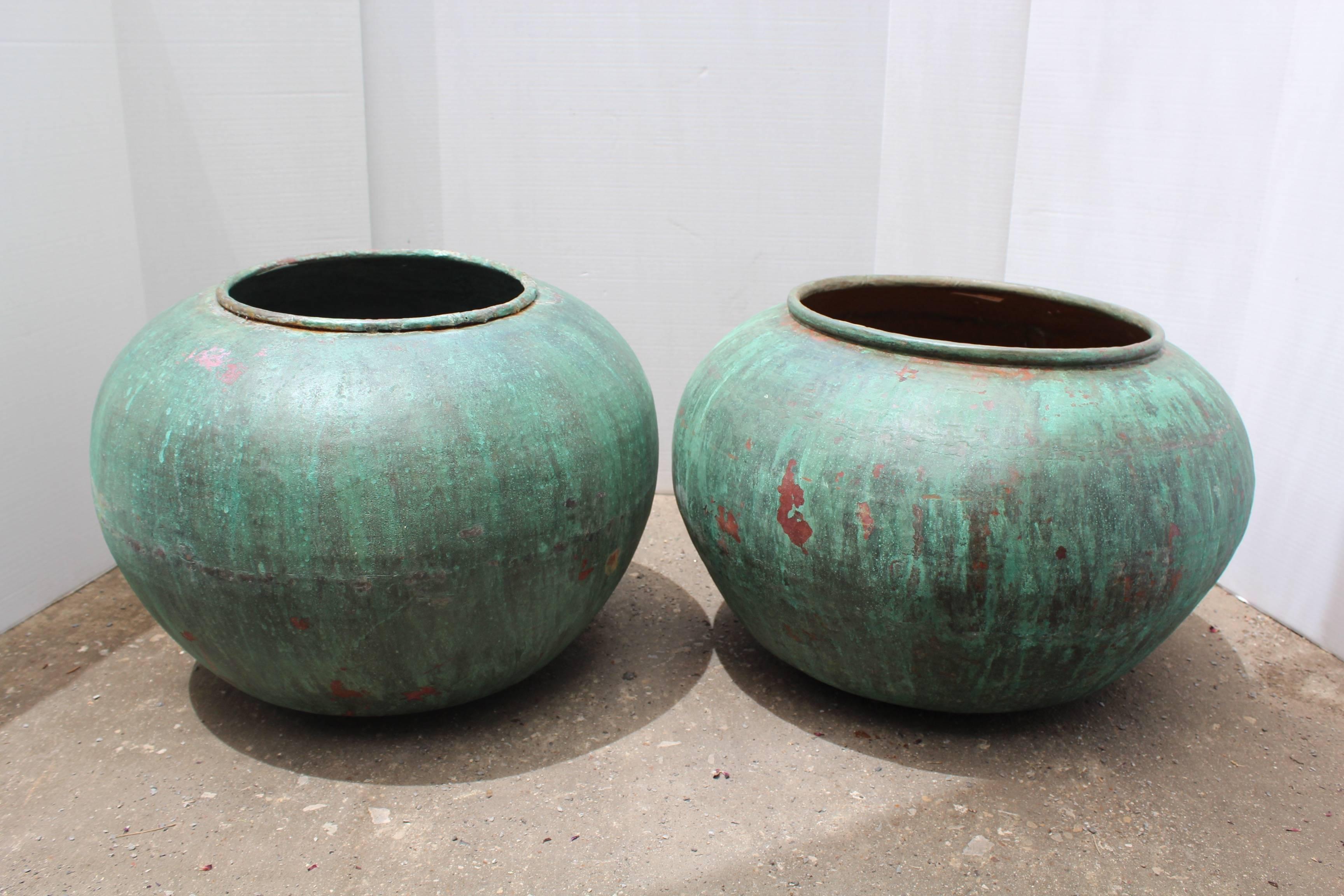 Bold and vibrant verdigris copper with a rich green patina and natural rust coloration inside the jars. 

These baluster shape jars can be applied to indoor or out. Circa 1930's. 

Each sold separately. 