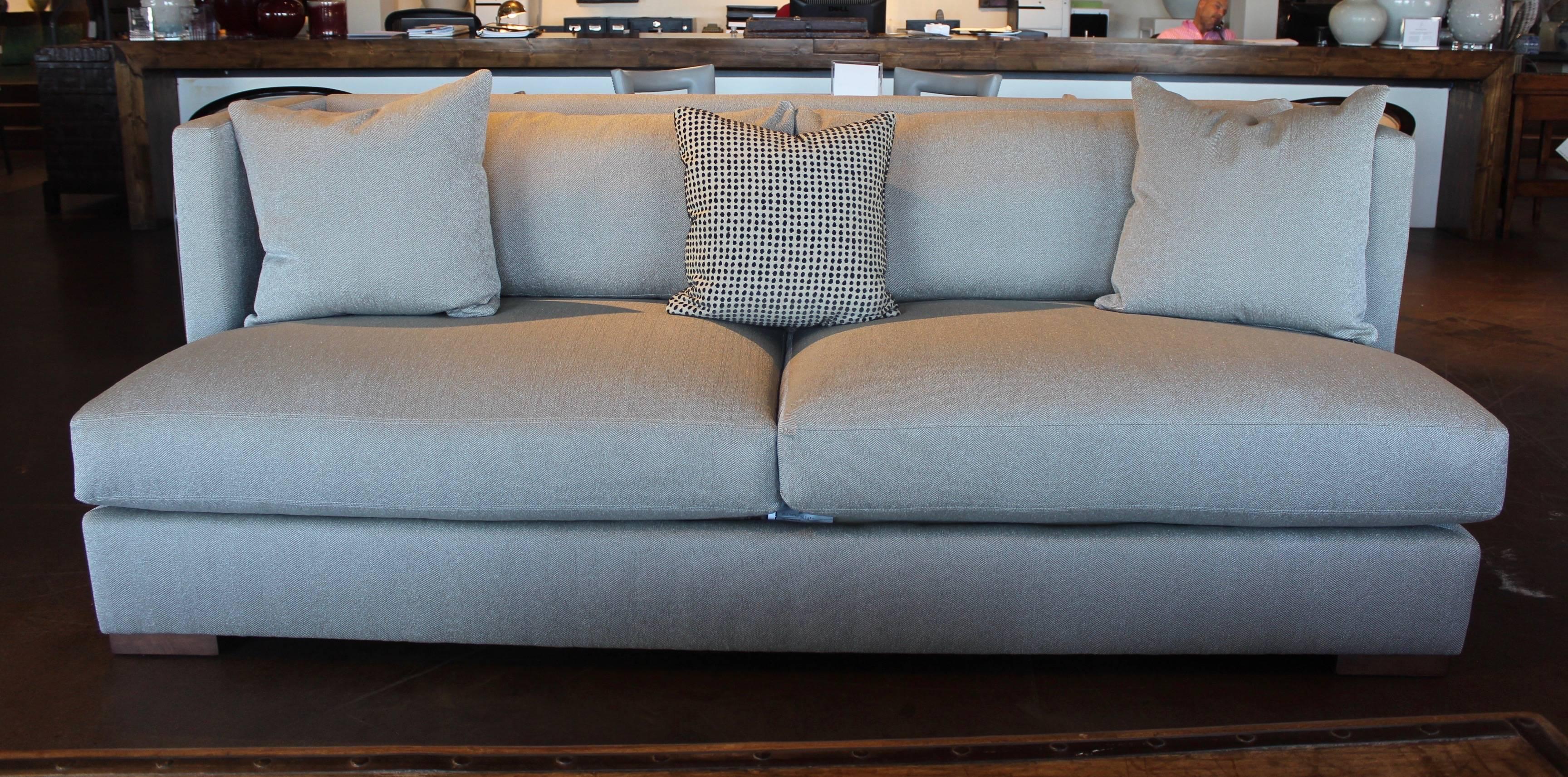 Modern high back grey sofa.
Brand: LEE.
Fabric is Hayes Pewter.
Cloud nine filling.
Light walnut legs. 

Overall measurement: 96' W X 44