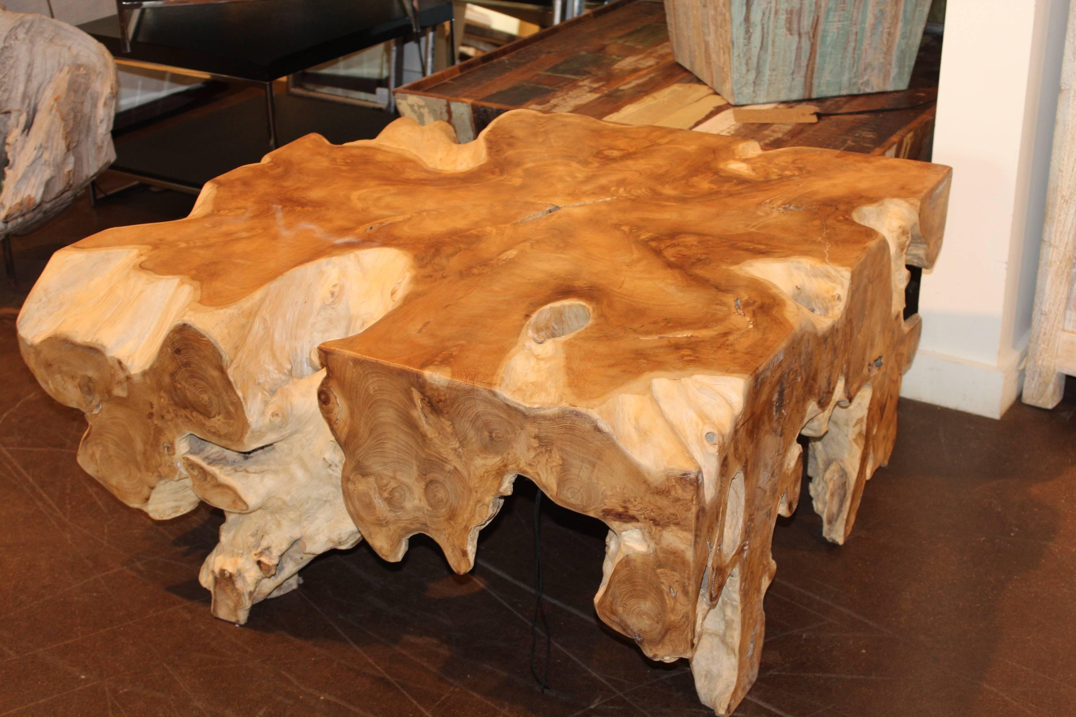 Unusual organic expression teak coffee table.