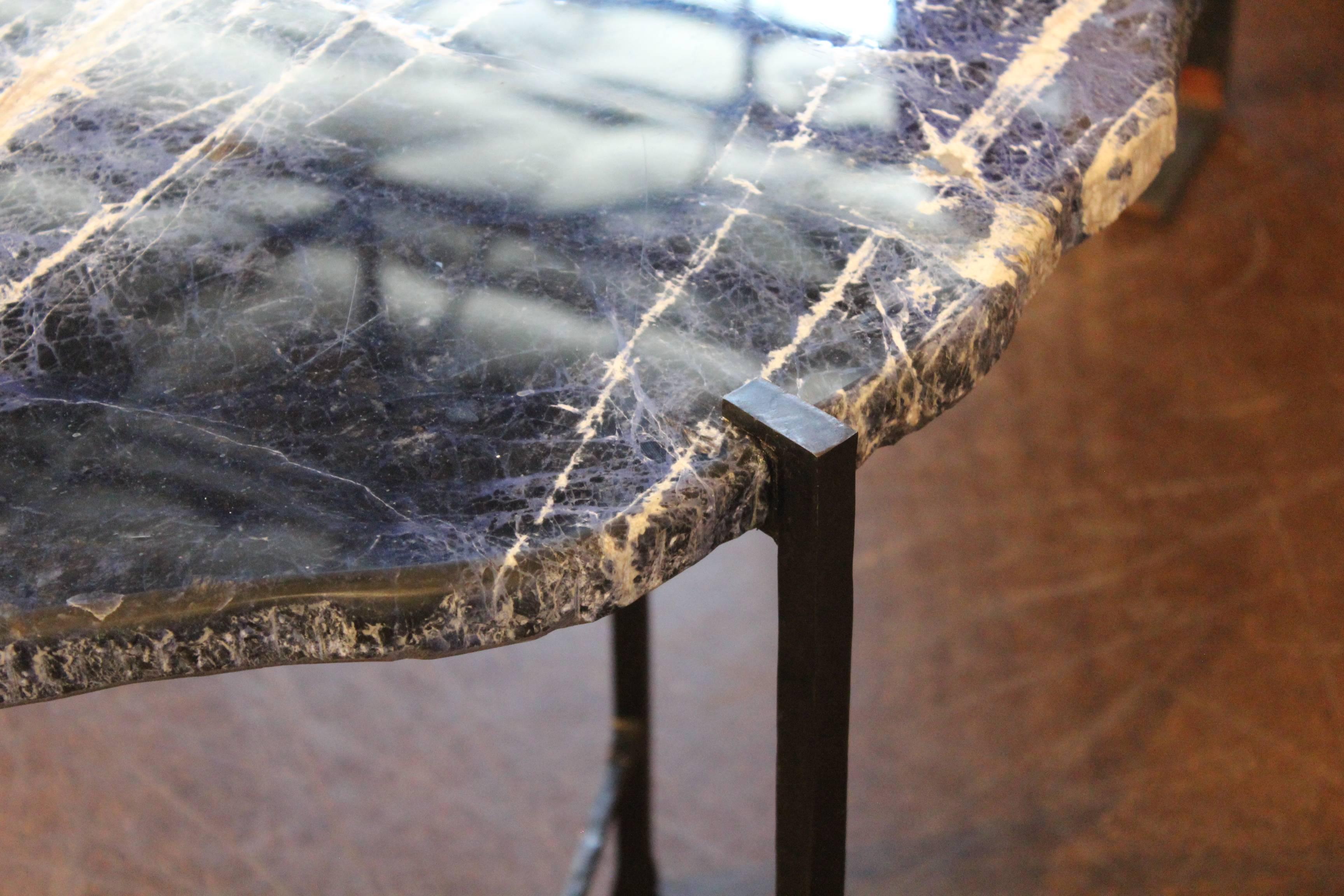 Sodalite slab top with custom oil rubbed iron base. This large size can be used with the smaller one for a nested look.
Sodalite is known for its often bright -blue color and it usually contains white veins, or streaking.


Brendan Bass Custom - 