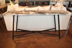 Custom Console with Hammered  Steel Base. Leathered Marqina Marble Top