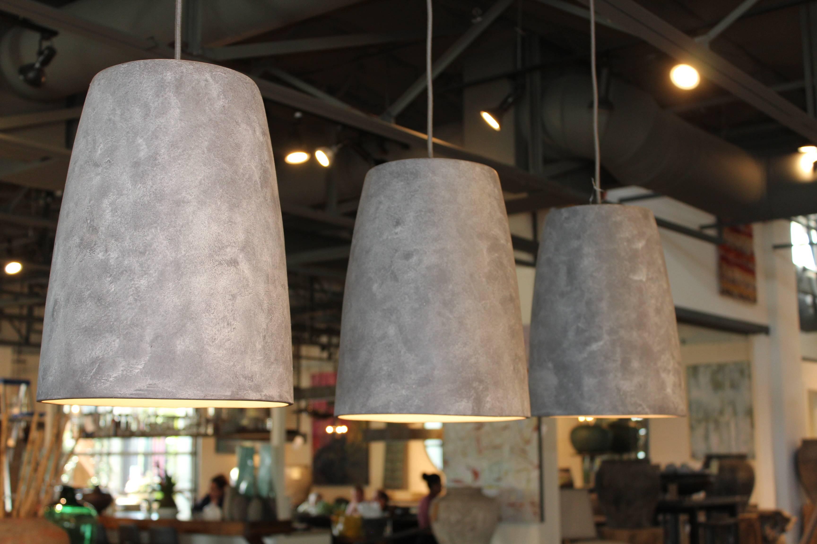 Conical porcelain pendant light. Designed by Brendan Bass and Artisan made in Italy. Mottled texture with dove grey finish.


Brendan Bass Custom -  Item can be reproduced