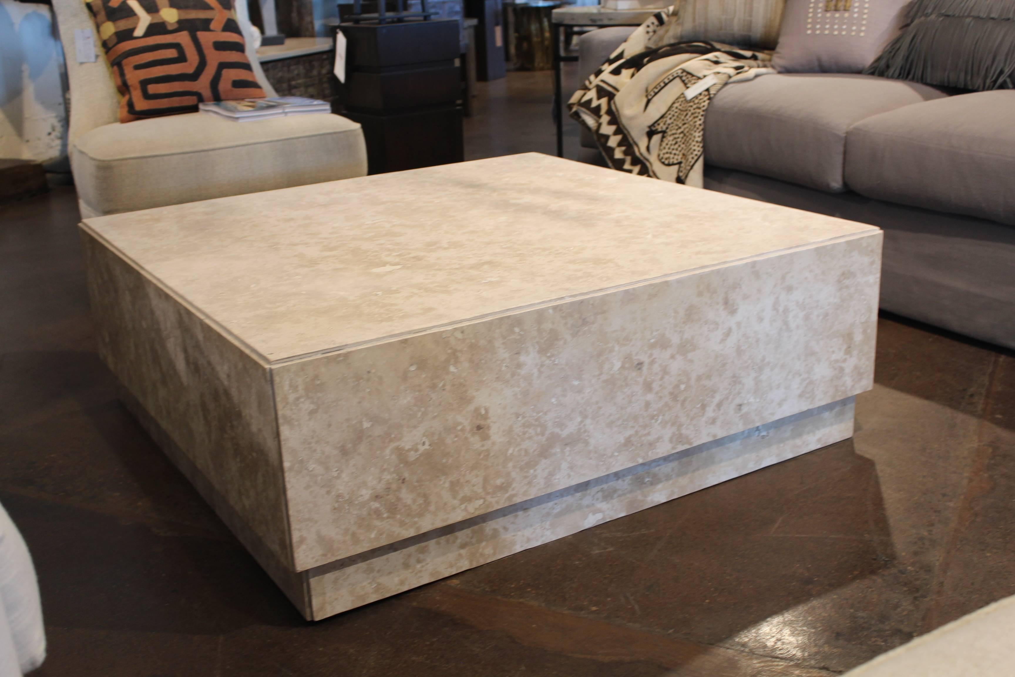 Contemporary coffee table with mitered corners in honed travertine marble.


Brendan Bass Custom -  Item can be reproduced