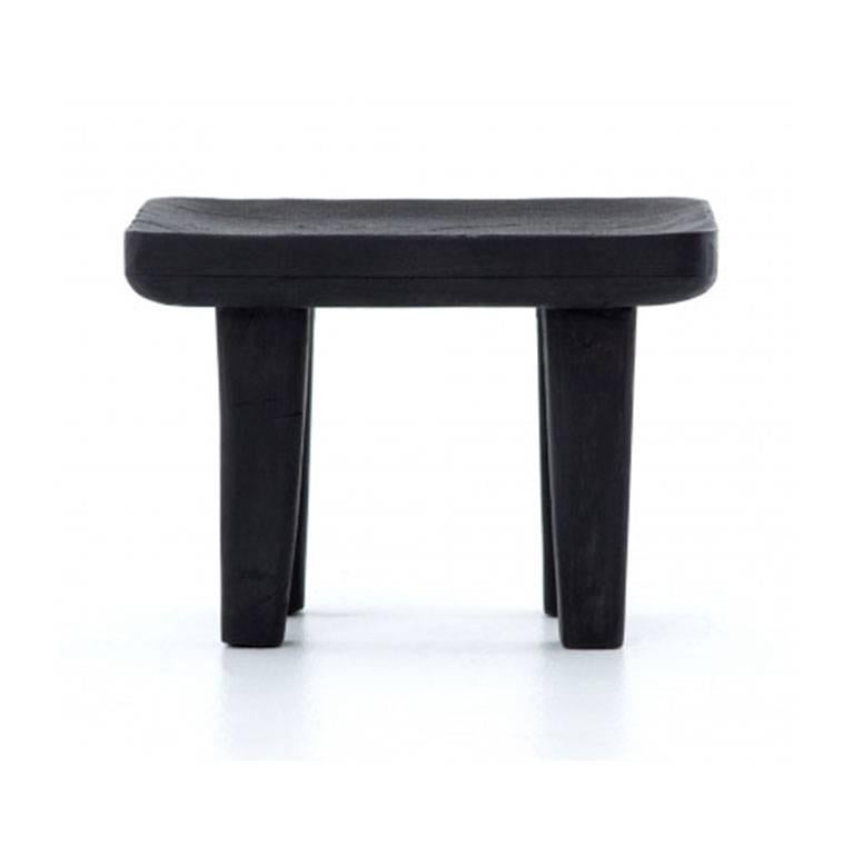 Black mango wood maintains its rich beauty via Shou Sugi Ban, a Japanese wood-burning technique which results in a charred effect. Sized perfectly to use as a stool, ottoman or small accent.