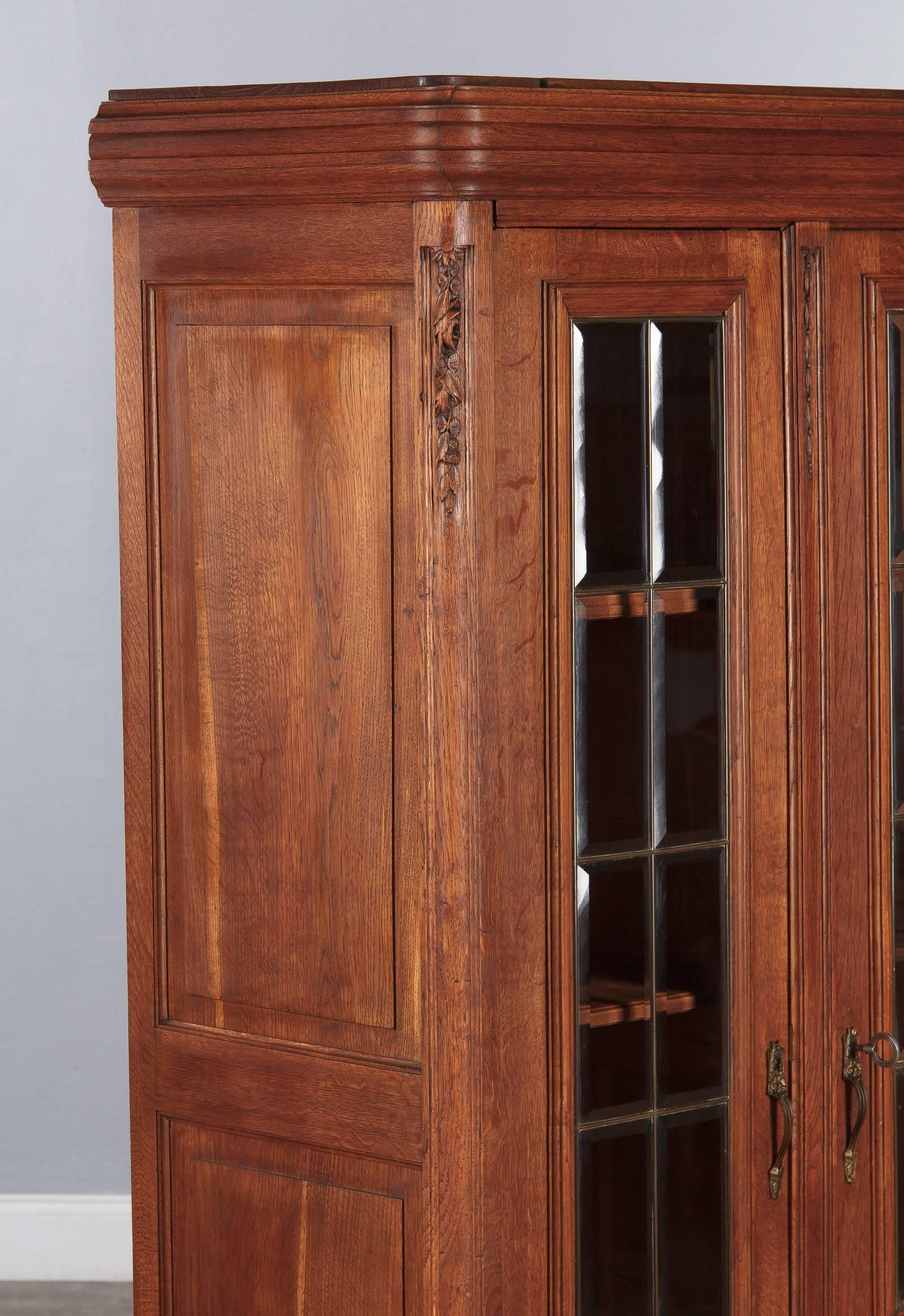French Louis XVI Style Golden Oak Three-Door Bookcase, 1900s In Good Condition In Austin, TX