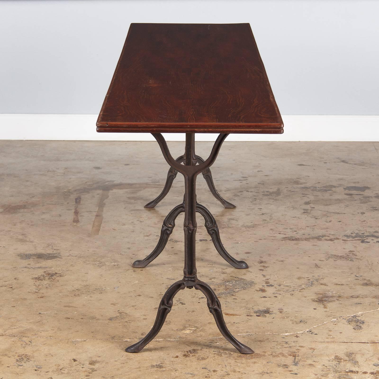 Industrial French Iron Base Bistro Table with Lacquered Wooden Top, 1920s