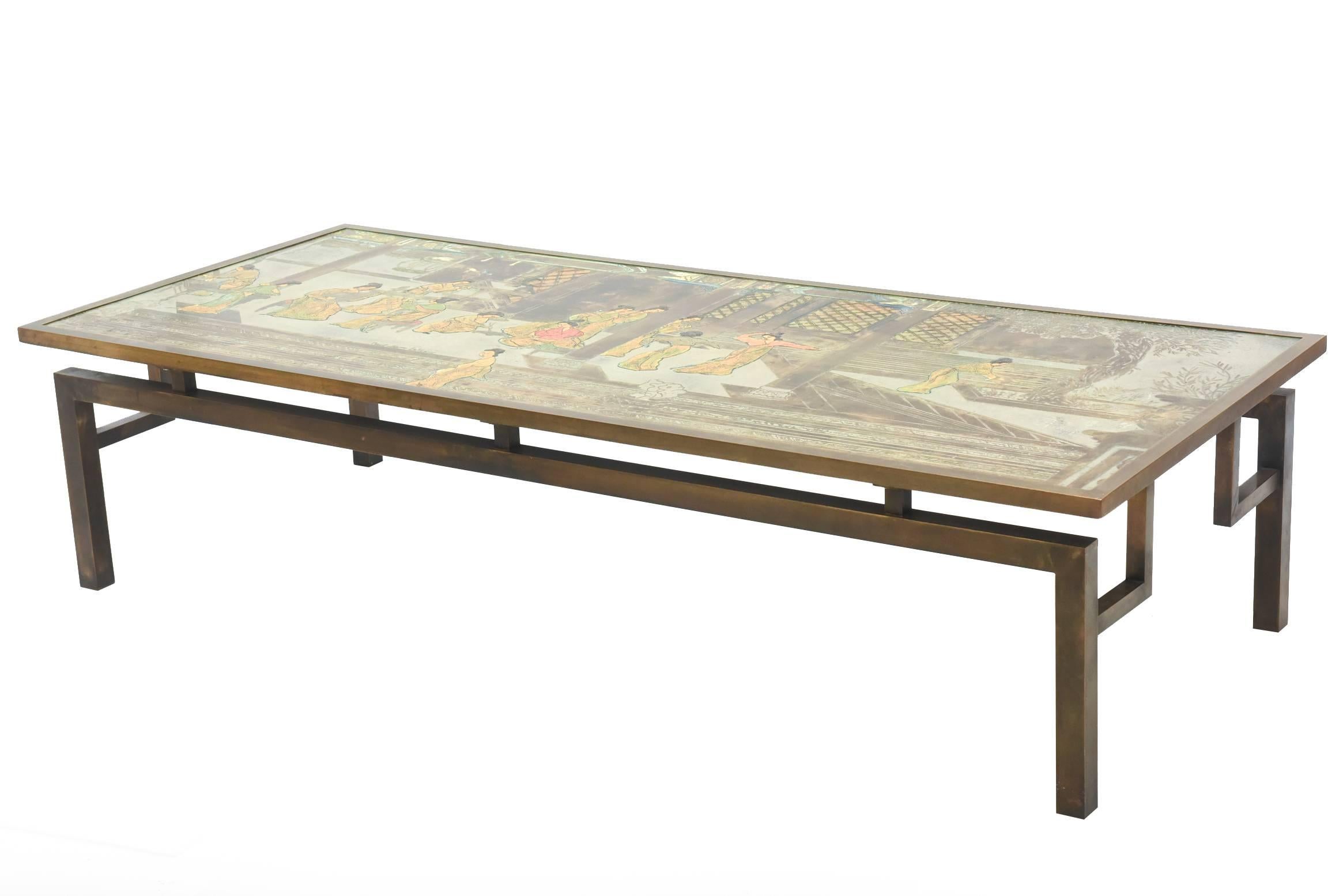 the top overall in oriental motif with painted and patinated sections, on a base with pierced supports on square legs.