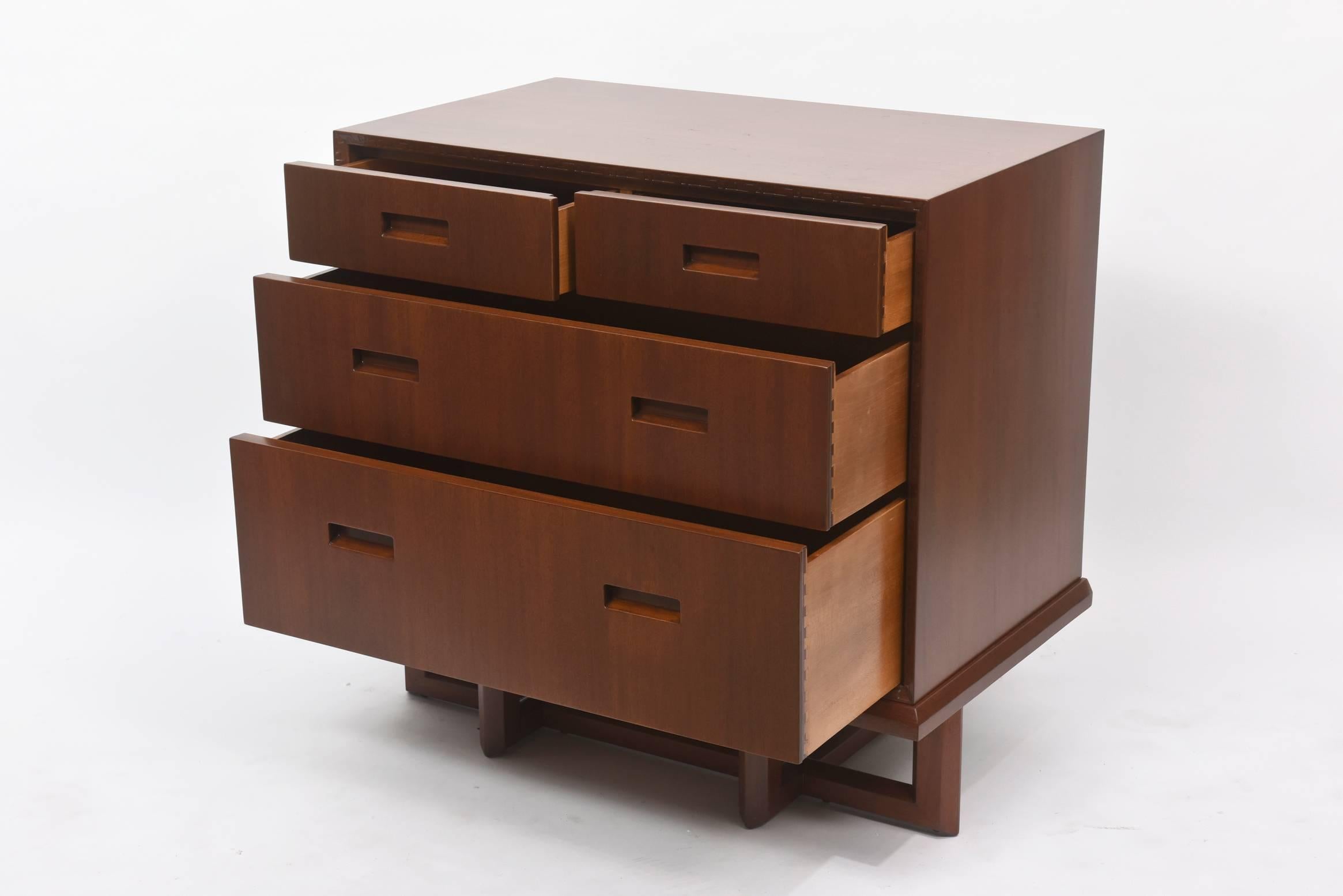 A rare pair of mahogany three-drawer commodes.