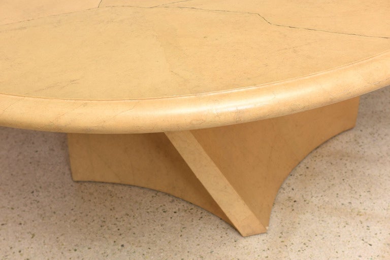 All-over in goatskin, the circular top with lip edge above a twisting pedestal base.