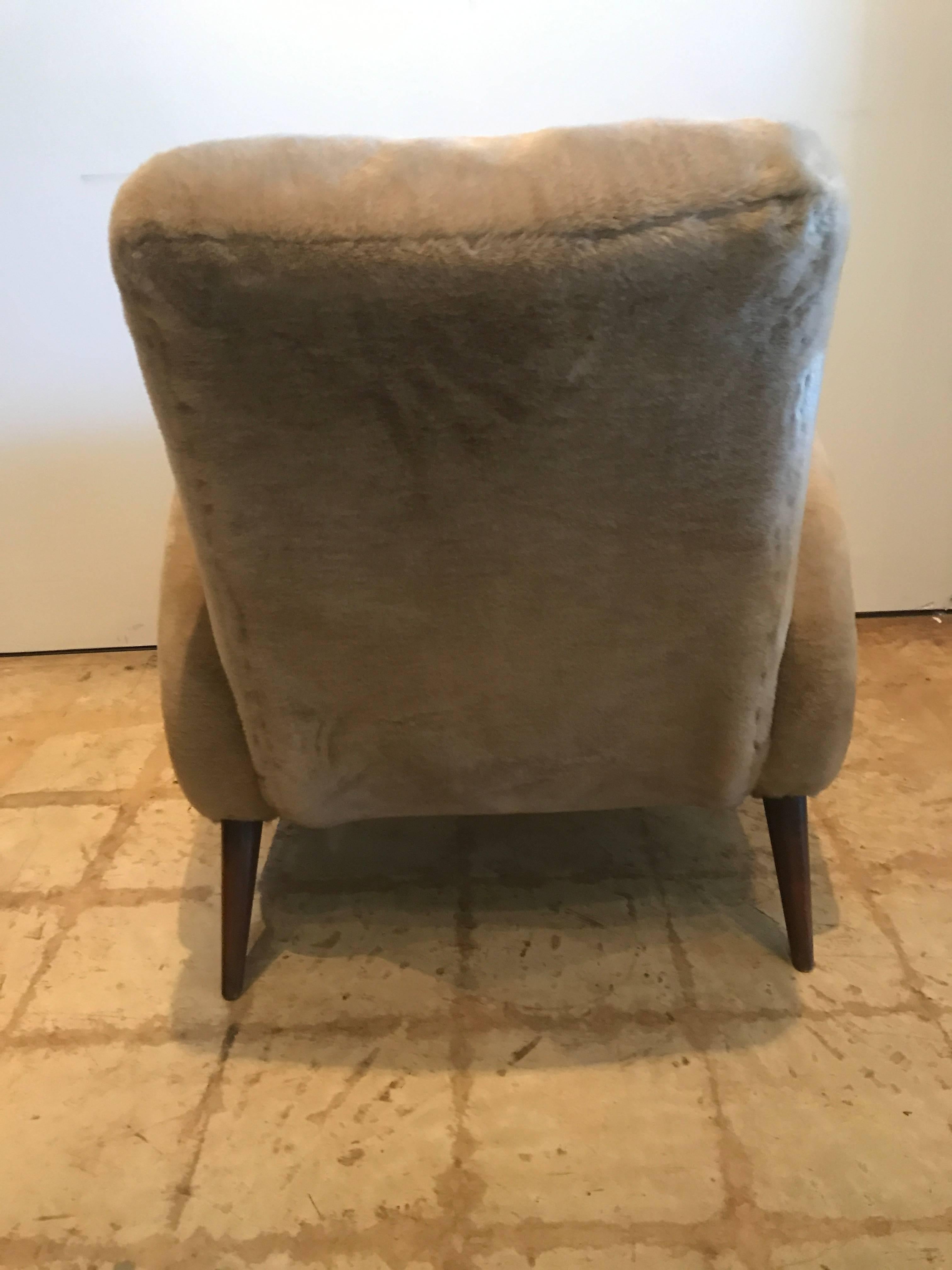 Fully upholstered in original "polar bear" fabric on splayed walnut legs.
Literature- jean royere- jean-louis gaillemin
jean royere- jacques lacoste, patrick seguin.