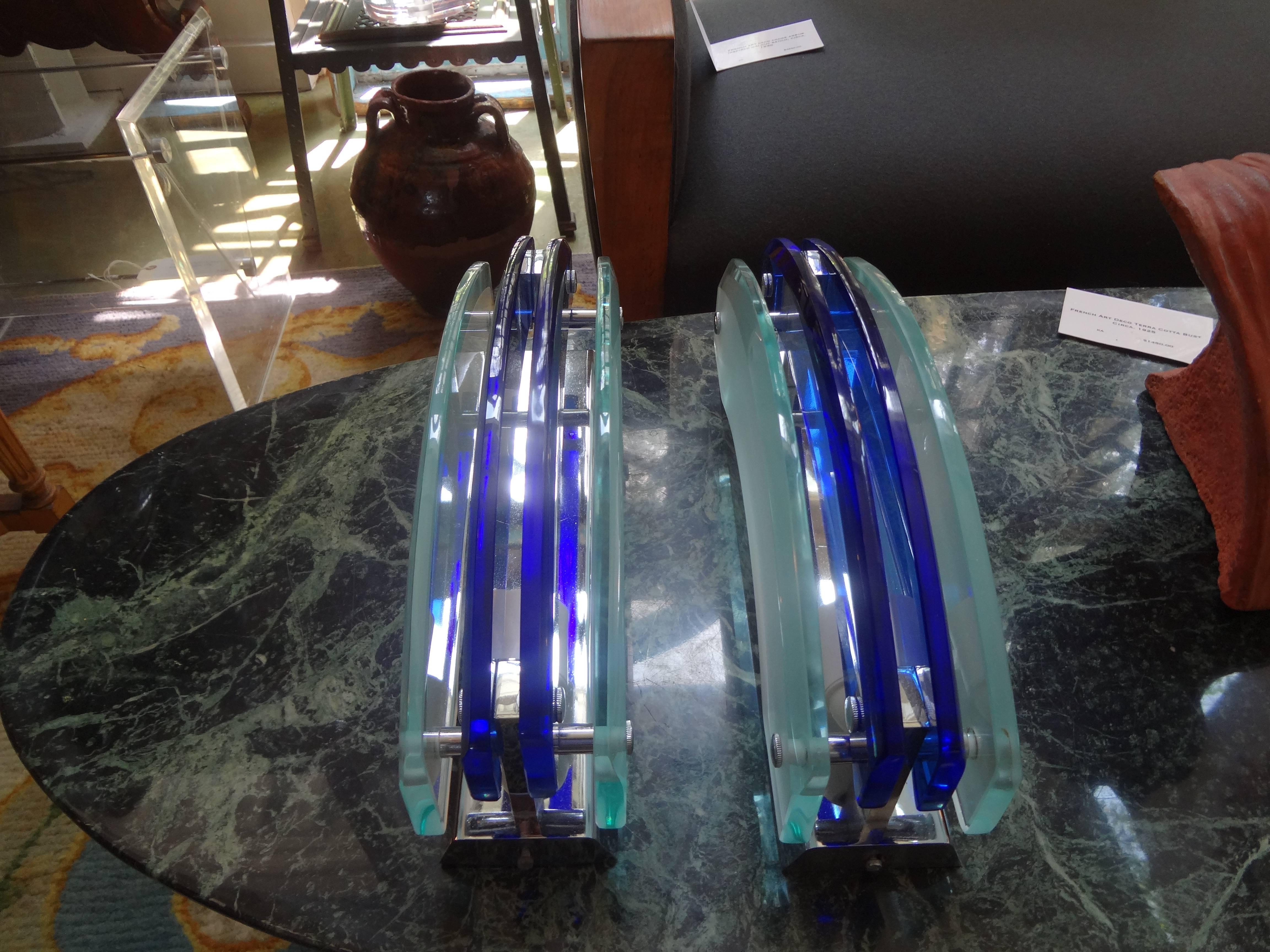Great pair of Italian Mid-Century Modern Murano glass sconces by Veca comprised of two sheets of frosted beveled glass on the exterior and two sheets of cobalt blue beveled glass in the center. These vintage Murano glass sconces have an Art Deco or