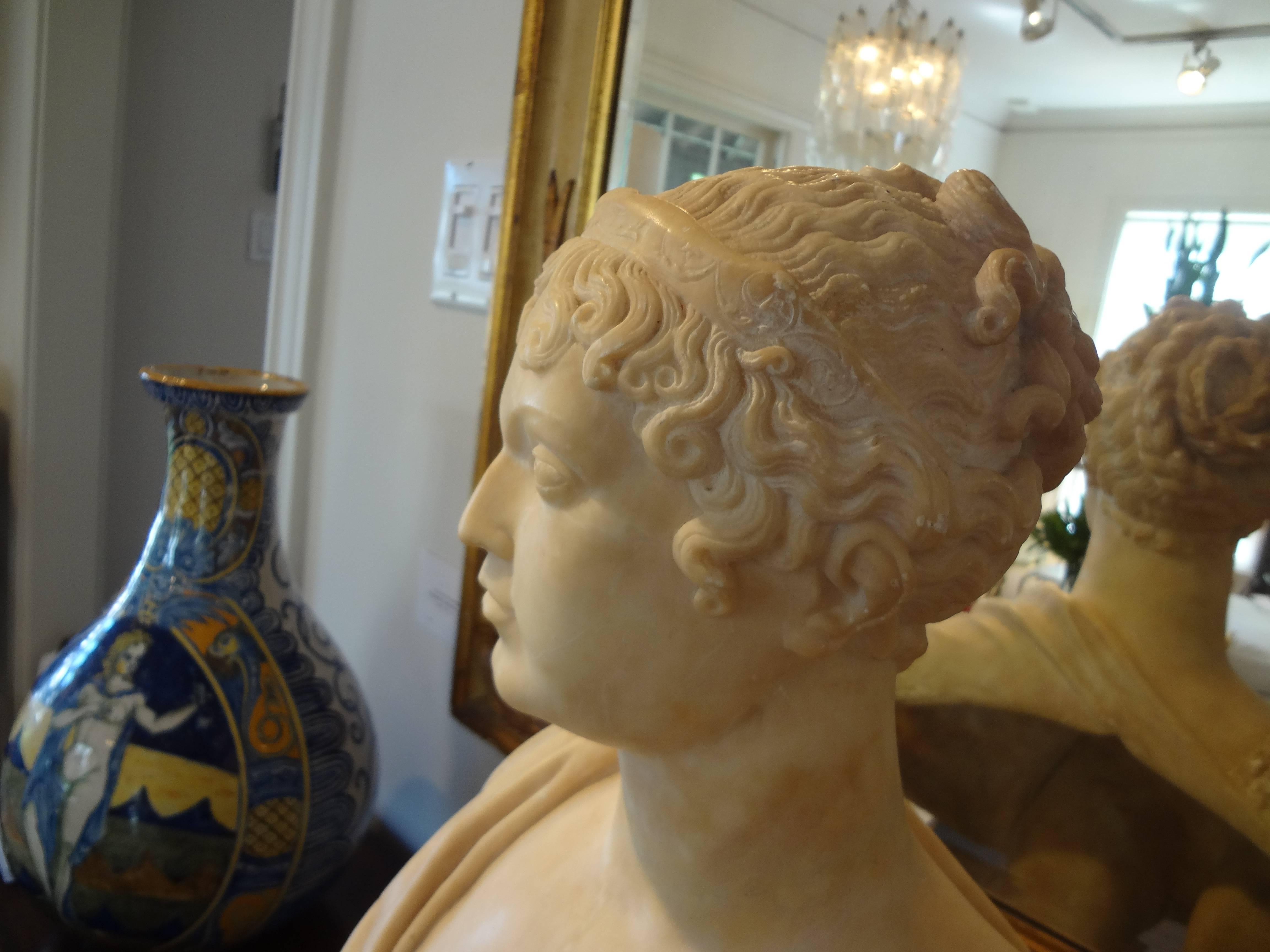19th century Italian alabaster bust.
Well sculpted antique Italian alabaster or marble bust of a classical female mounted on a plinth. This is a beautifully detailed antique alabaster bust sculpture.
 