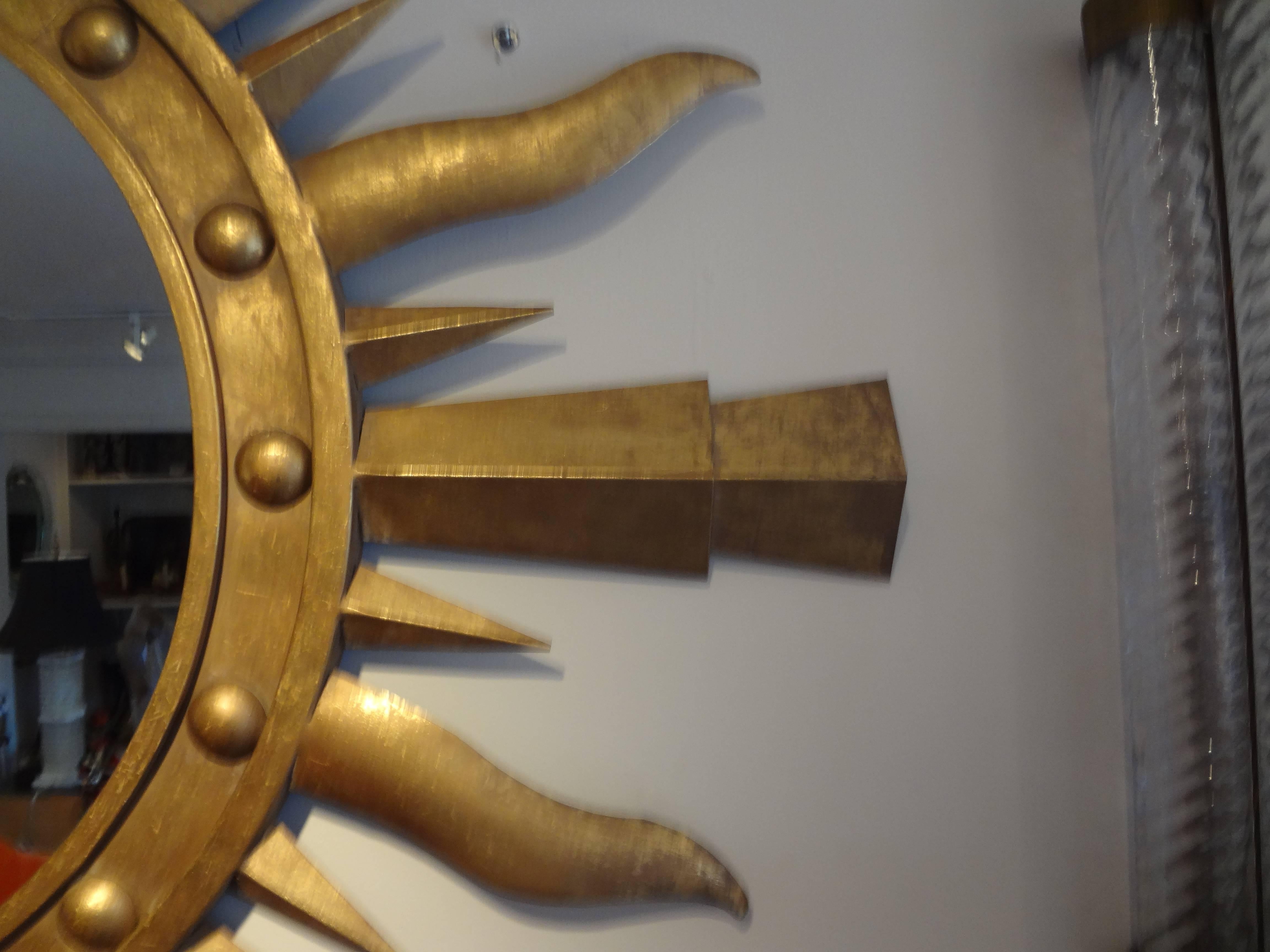 Mid-20th Century Large Midcentury Italian Gilt Iron Sunburst Mirror, Gilbert Poillerat Style