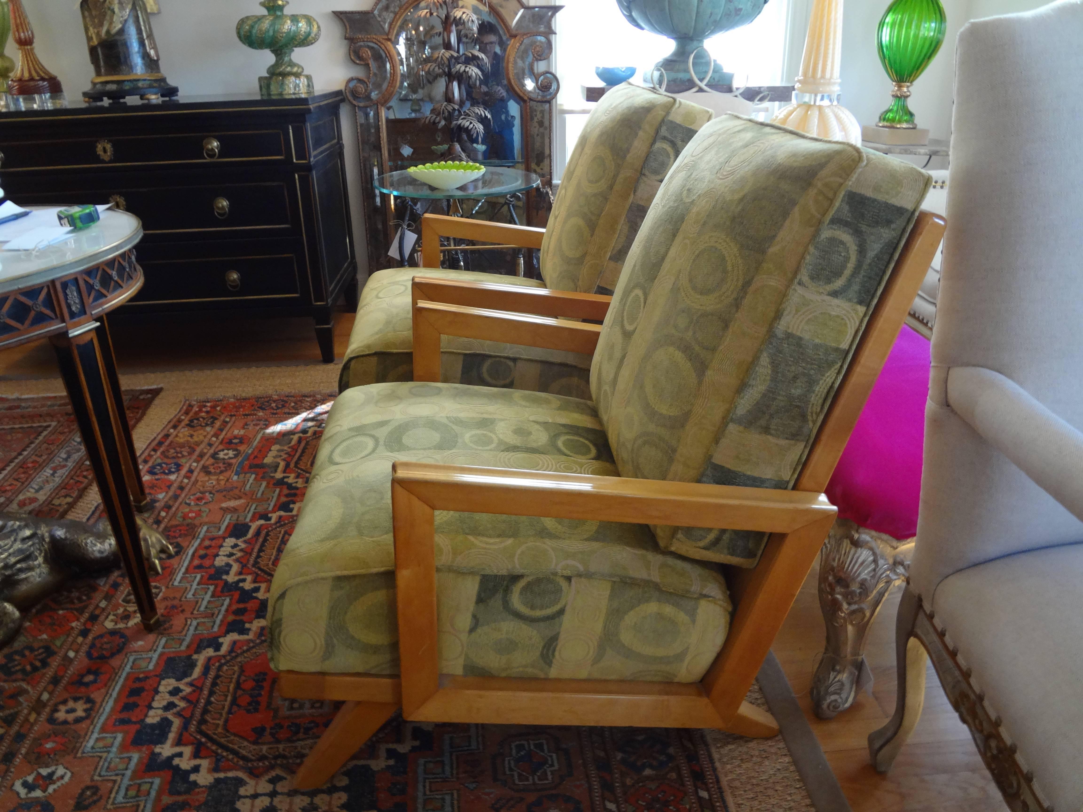 Unusual and extremely comfortable pair of French sycamore upholstered club chairs in the style of André Arbus.

Please click KIRBY ANTIQUES logo below to view additional pieces from our vast inventory.

  