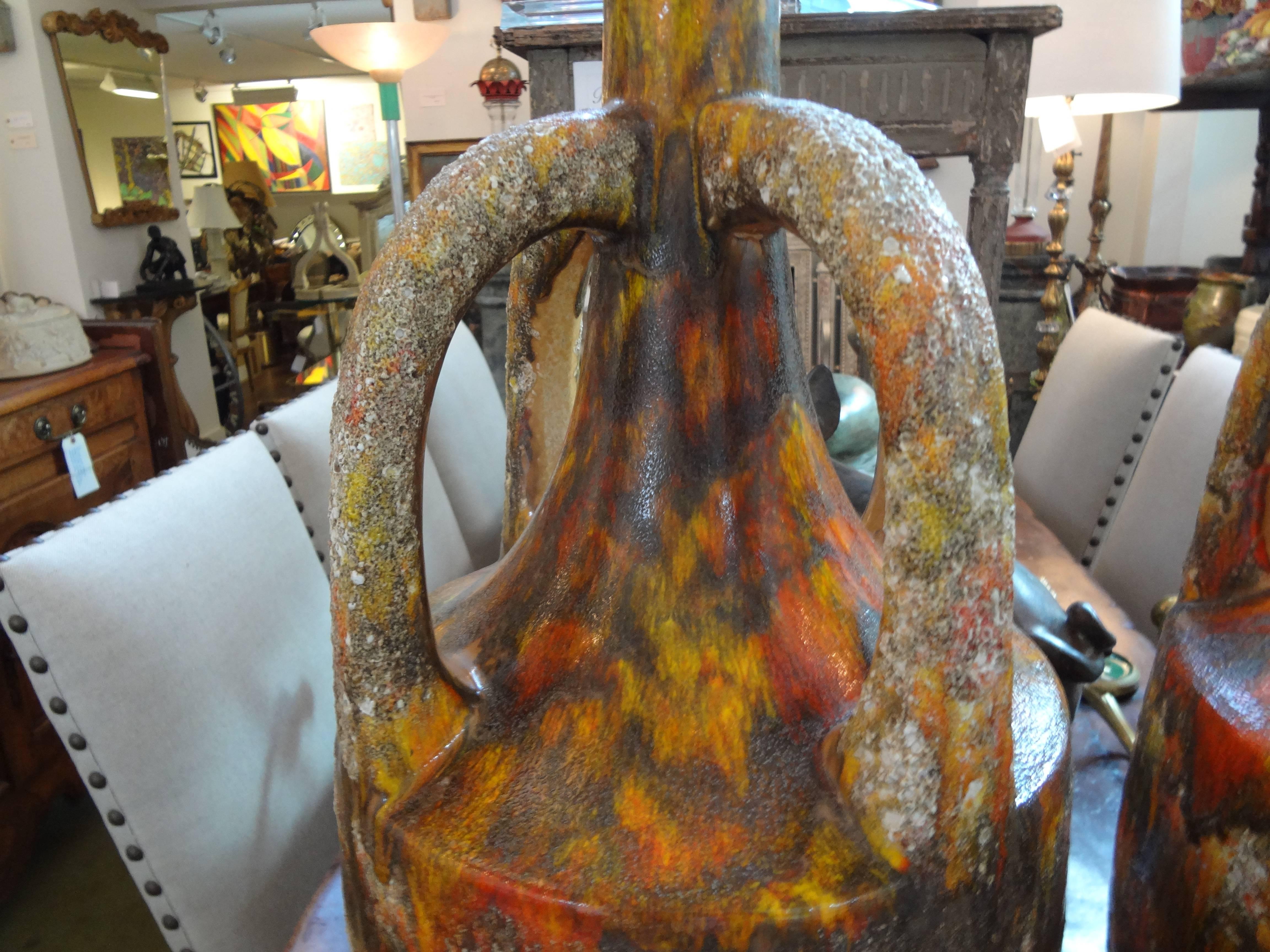 Unusual large pair of Italian Mid-Century glazed pottery lava lamps, newly wired with new sockets.  31 inches H. Inspired by Bitossi, Raymor, Zaccagnini, Gambone.
 