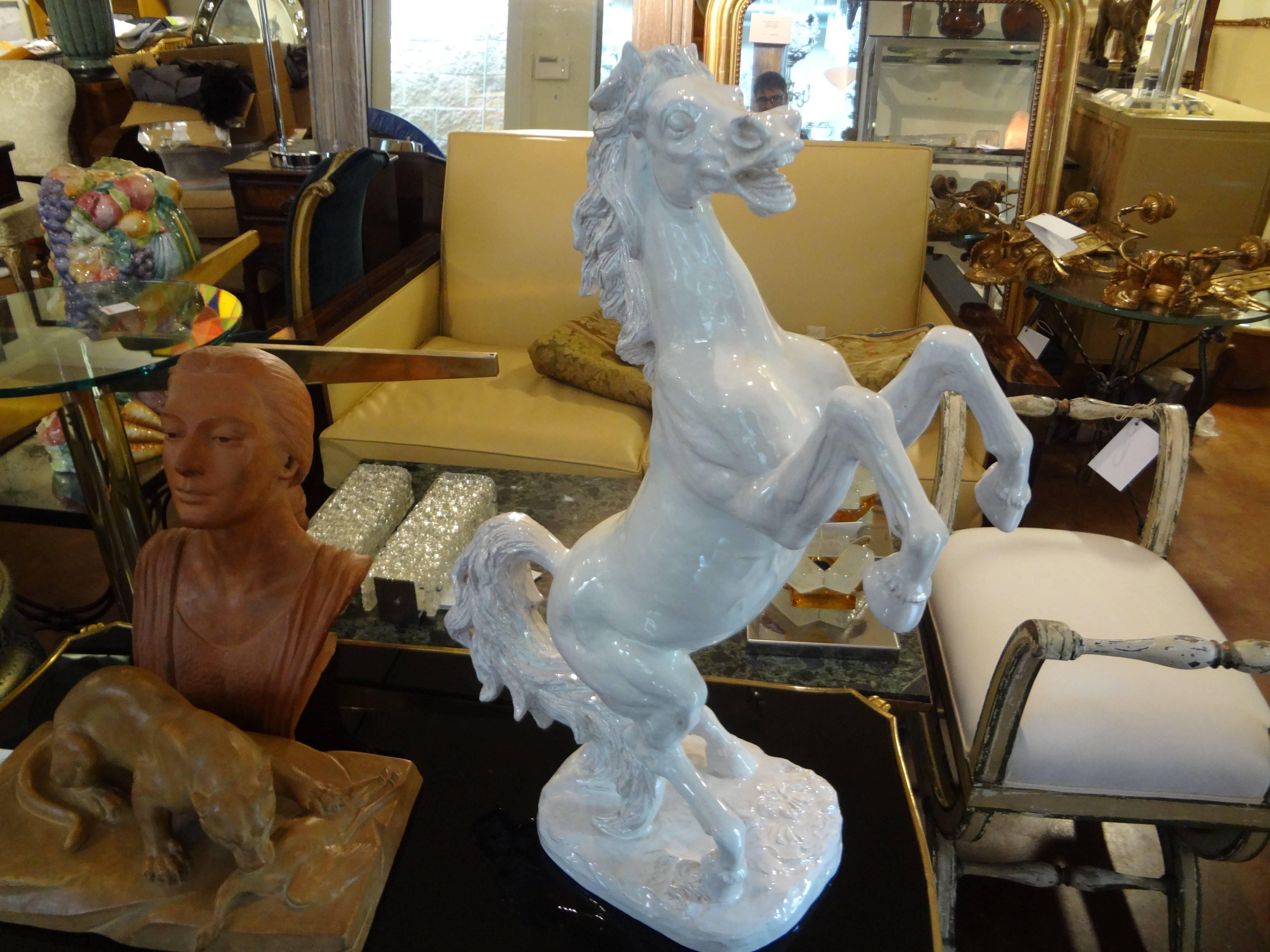 Large Italian white glazed terracotta horse sculpture.
Large 28