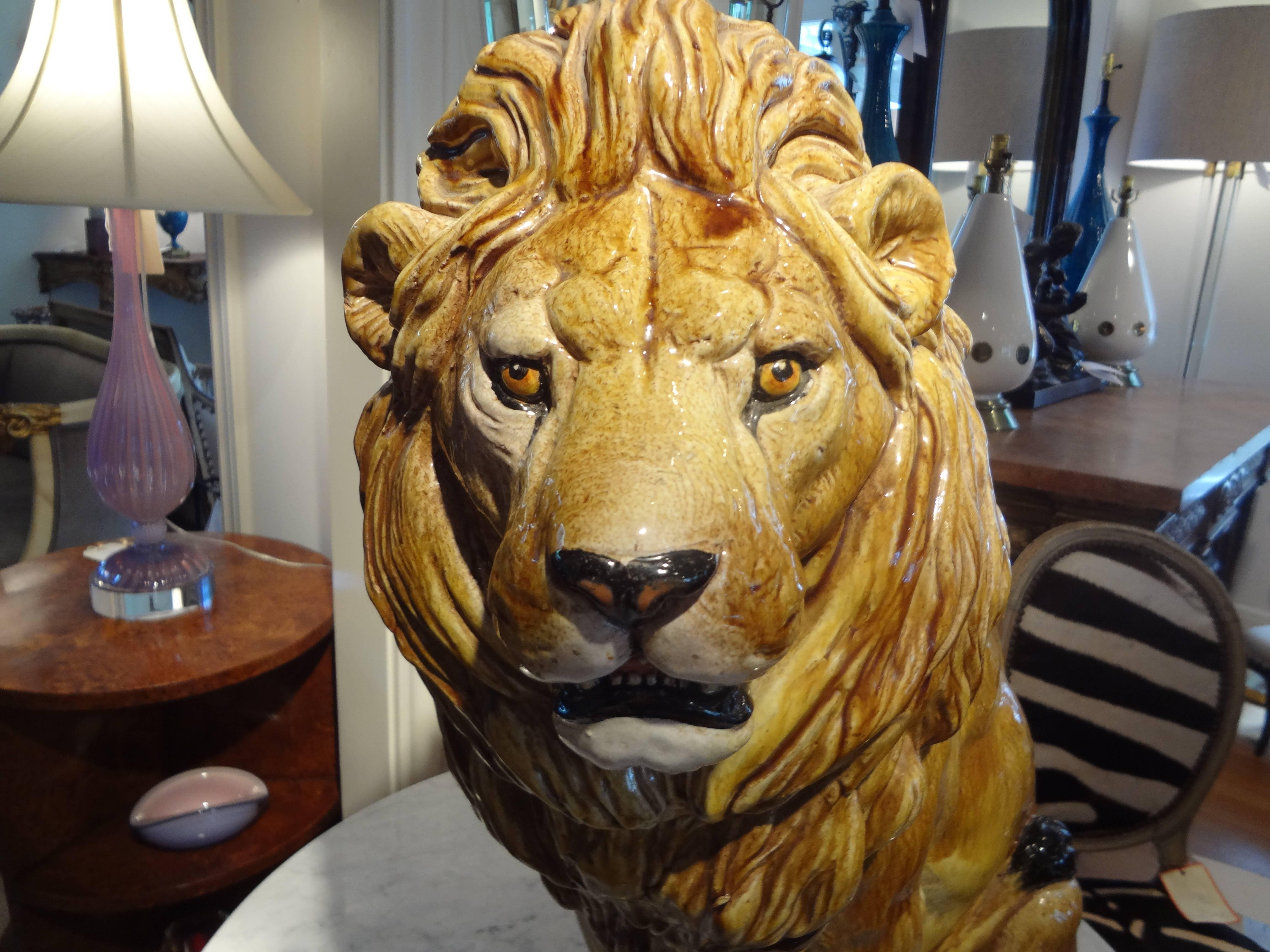 Realistic Italian glazed terracotta animal sculpture of a lion. Beautiful details.