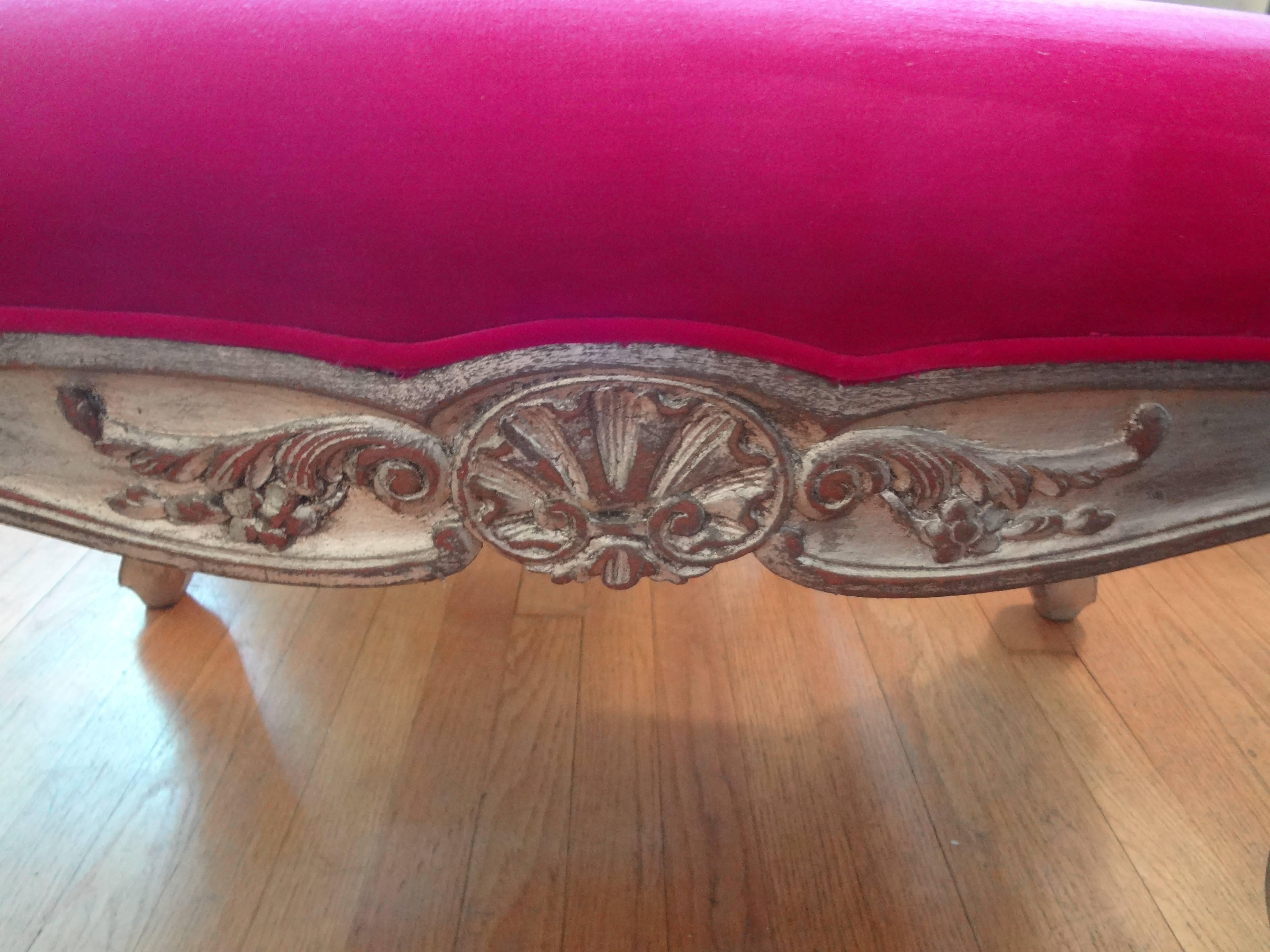 Stunning antique Italian Louis XV style silver gilt bench or ottoman taken down to frame and newly reupholstered in fuchsia velvet. Measures: 33.5 inches  x 17 inches.