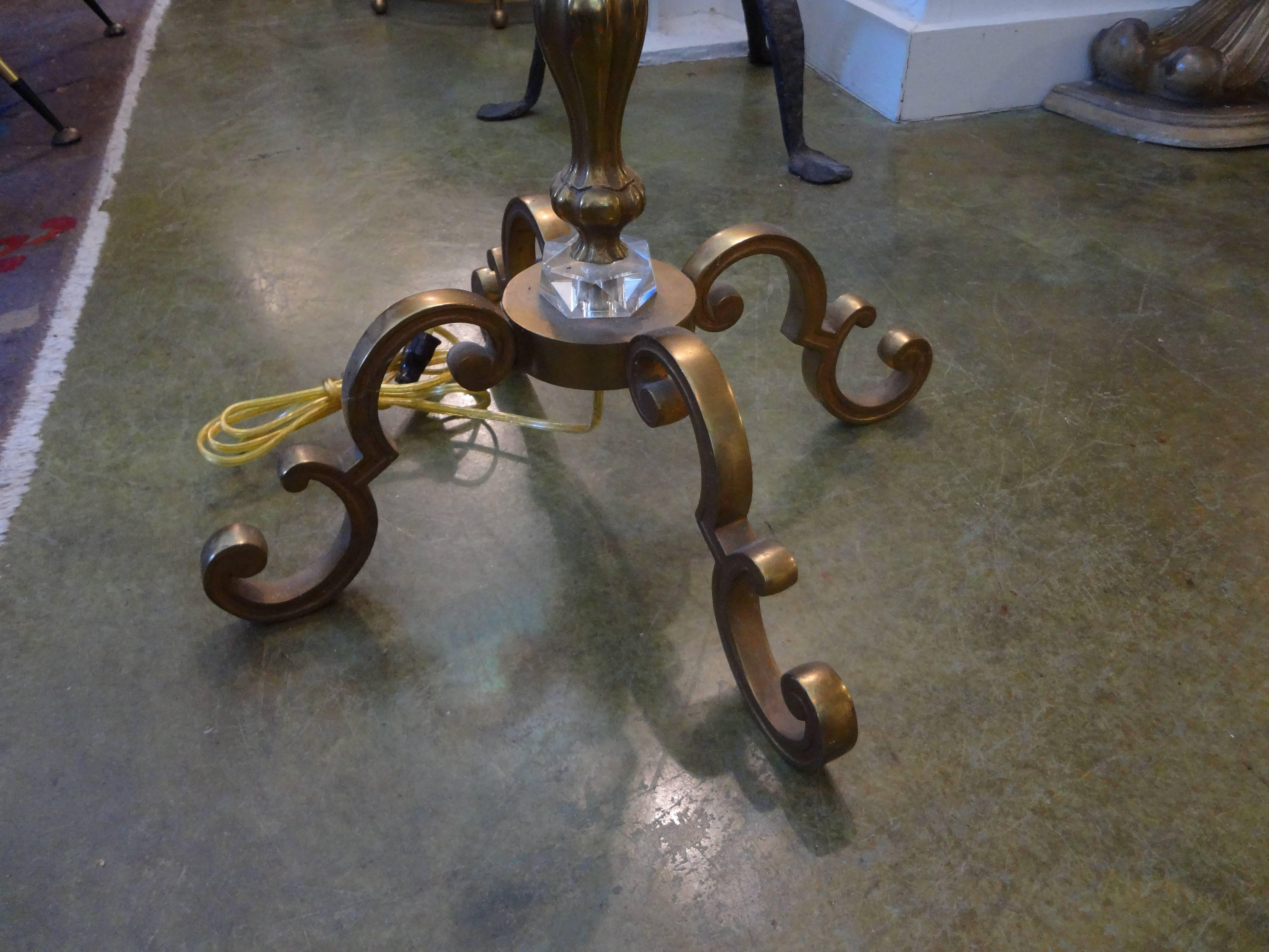 Midcentury French brass and glass floor lamp inspired by Jacques Adnet.
Stylish Jacques Adnet style French bronze or brass and glass floor lamp. Newly wired for U.S. market. (Shade as-is, is not included in this sale, best to select a new one).