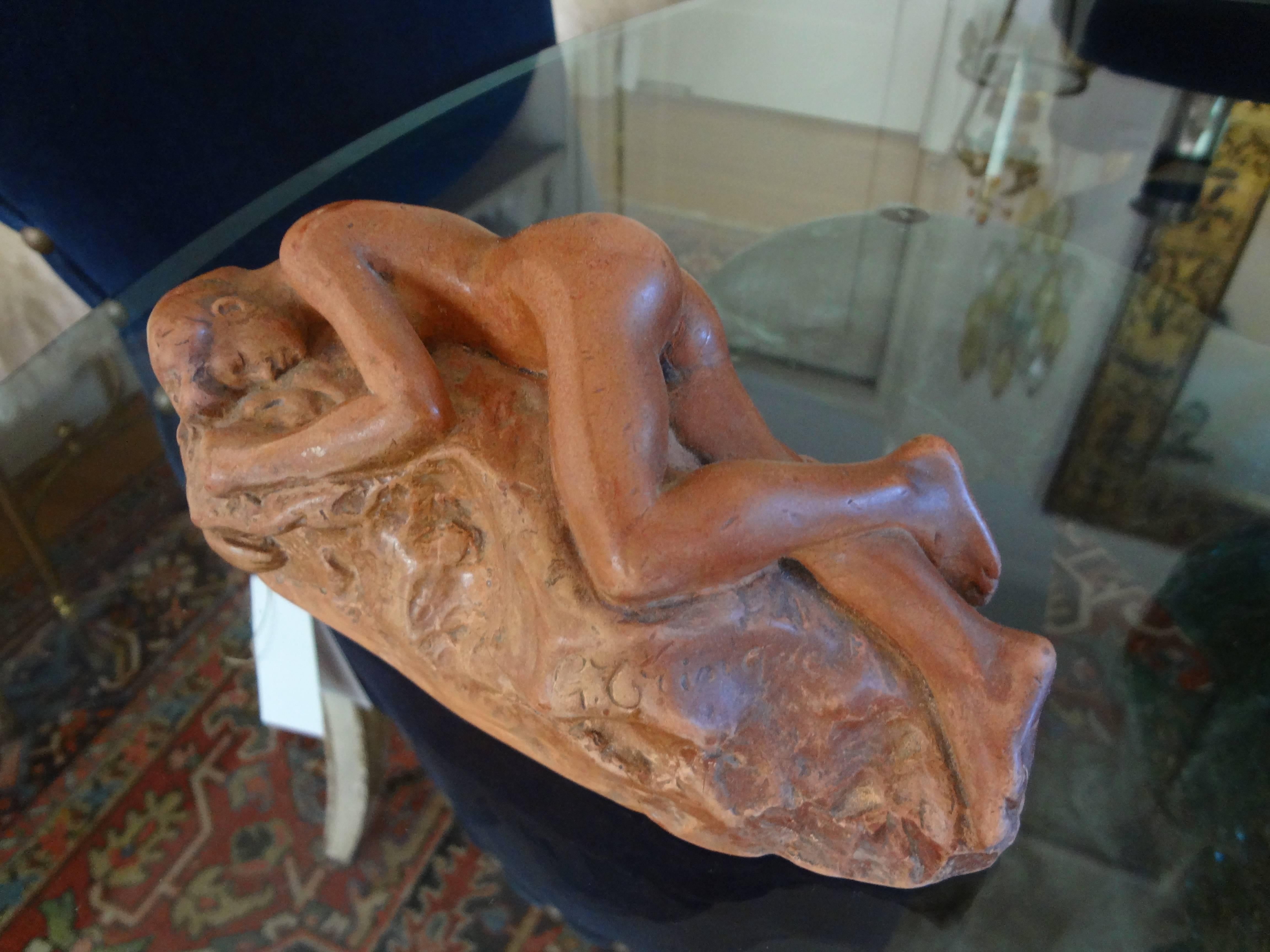 Beautifully executed French terracotta nude sculpture from the 1920s. This French figurative sculpture is signed George Trinque.
 
