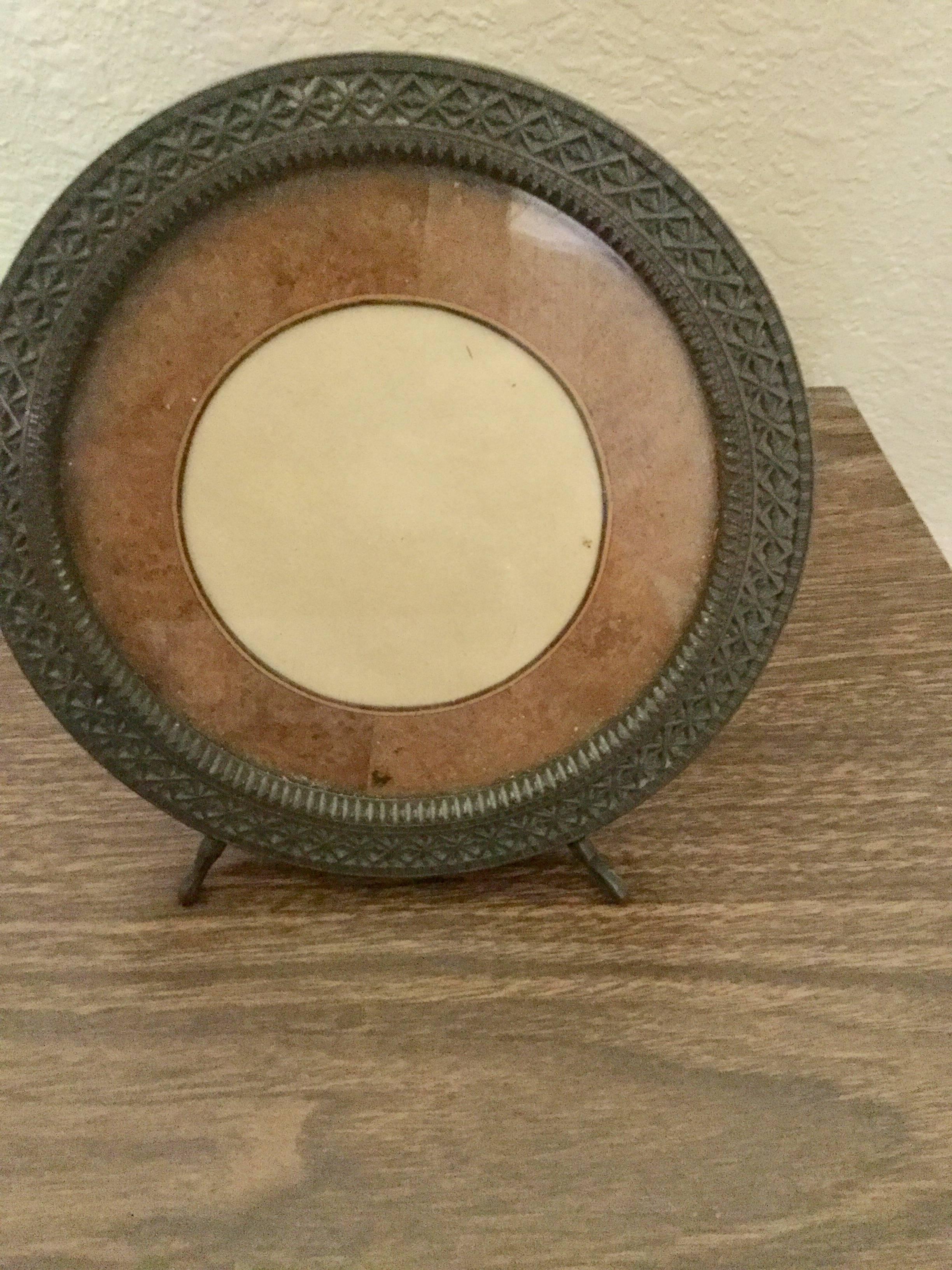 French Art Deco bronze picture/photograph frame. It is quite heavy with very fine detailing.
The work on this frame is outstanding down to the inside circle.
There is a 1 inch ring of bird's-eye maple on the inside mat and Macassar back. Original