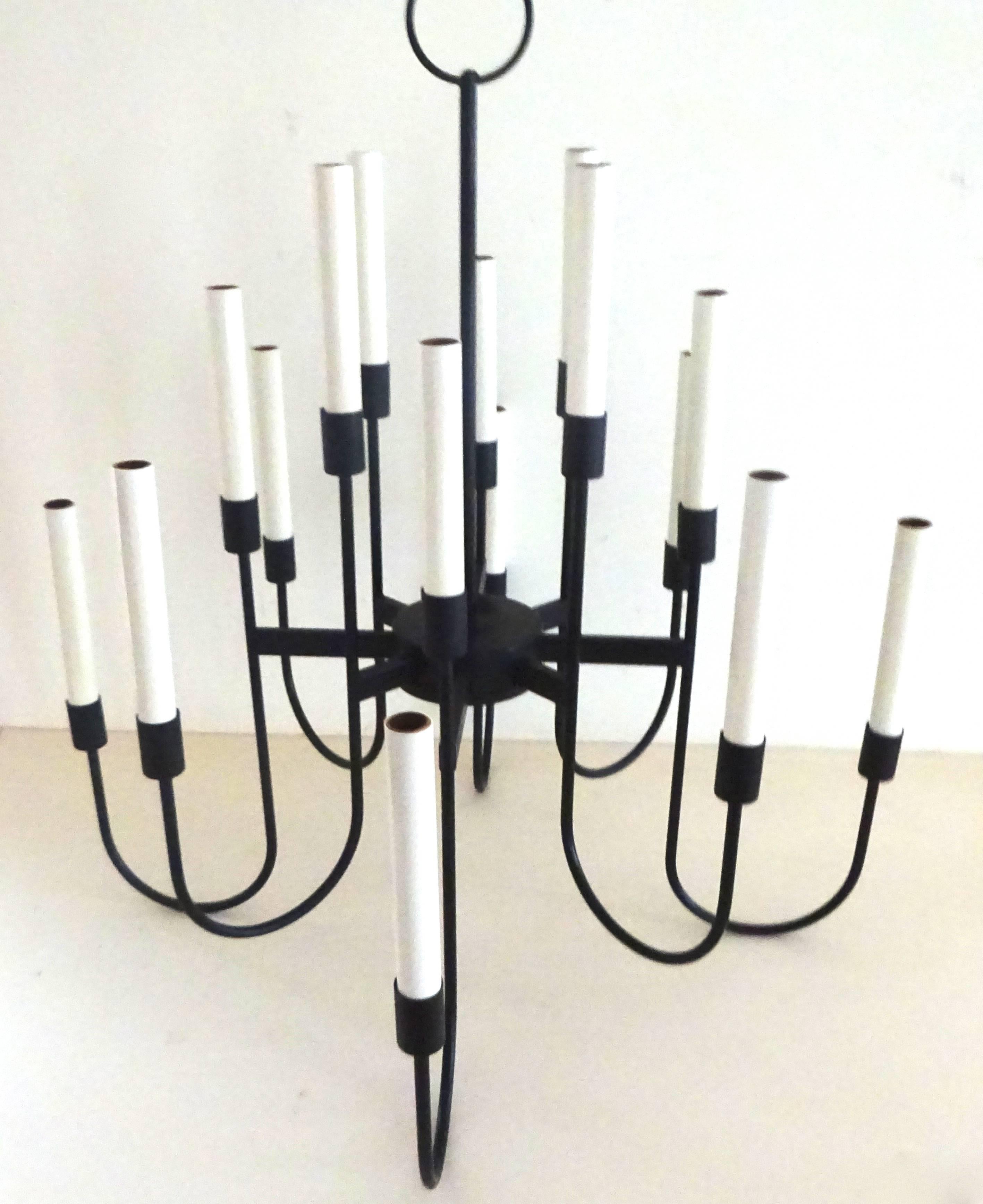 Modernist 1950s Lightolier wrought iron sixteen-light chandelier.