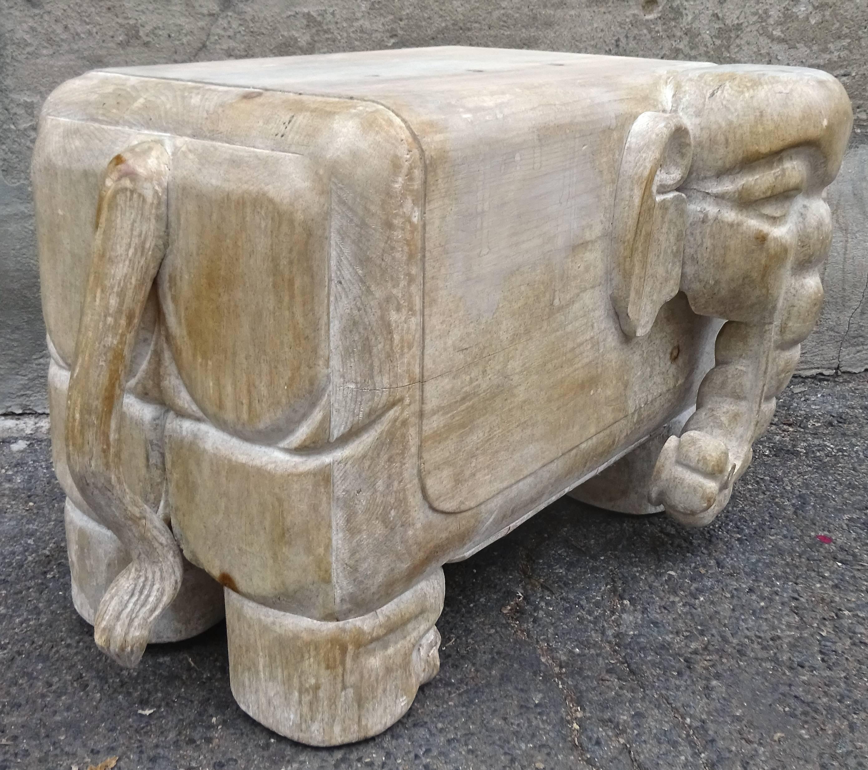 Sculptural 1970s Italian carved wood elephant table.