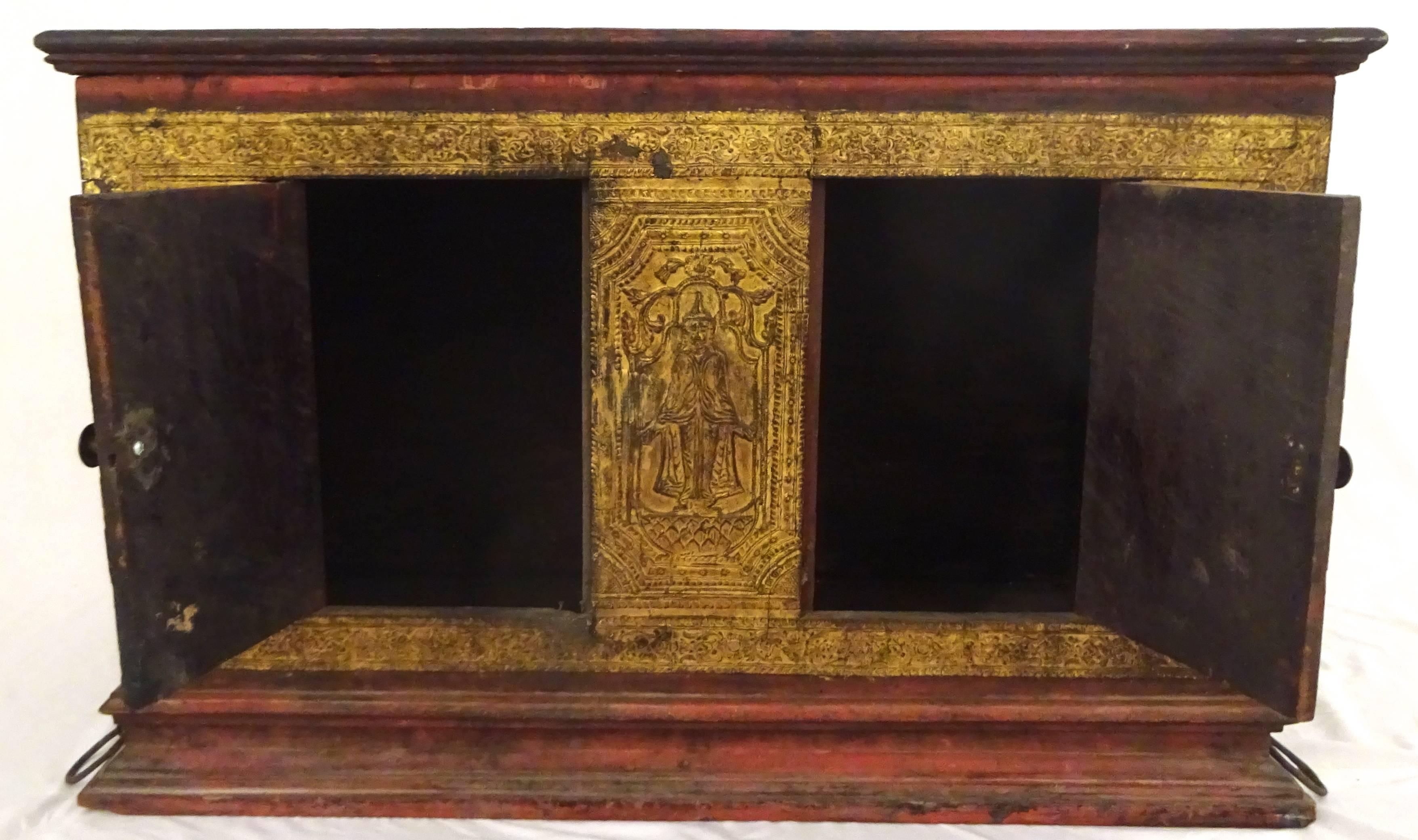 Stunning late 19th century Thai parcel-gilt and painted wedding trunk.