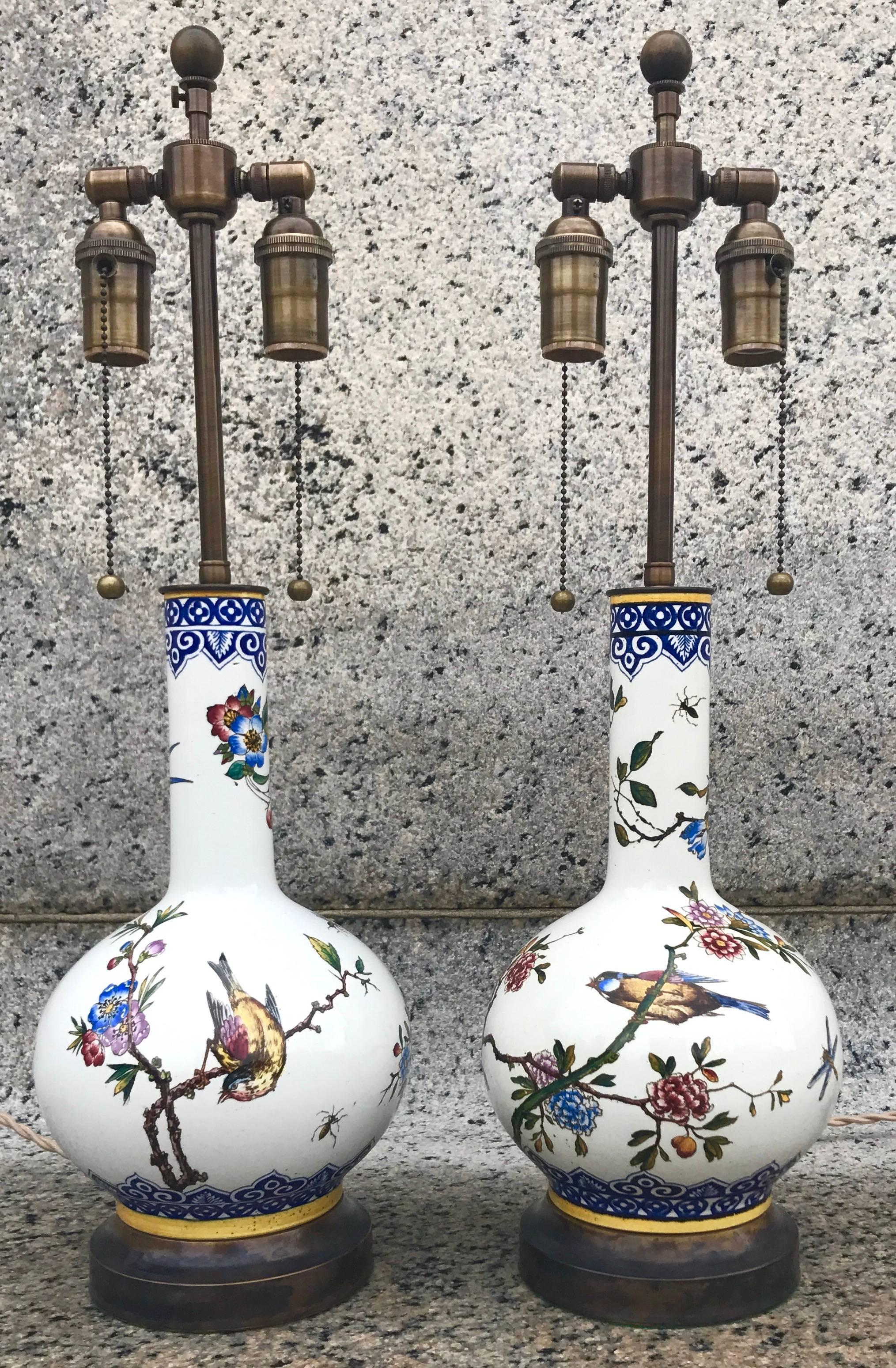 Chic pair of 19th century hand-painted porcelain table lamps by Gien Faience, France.