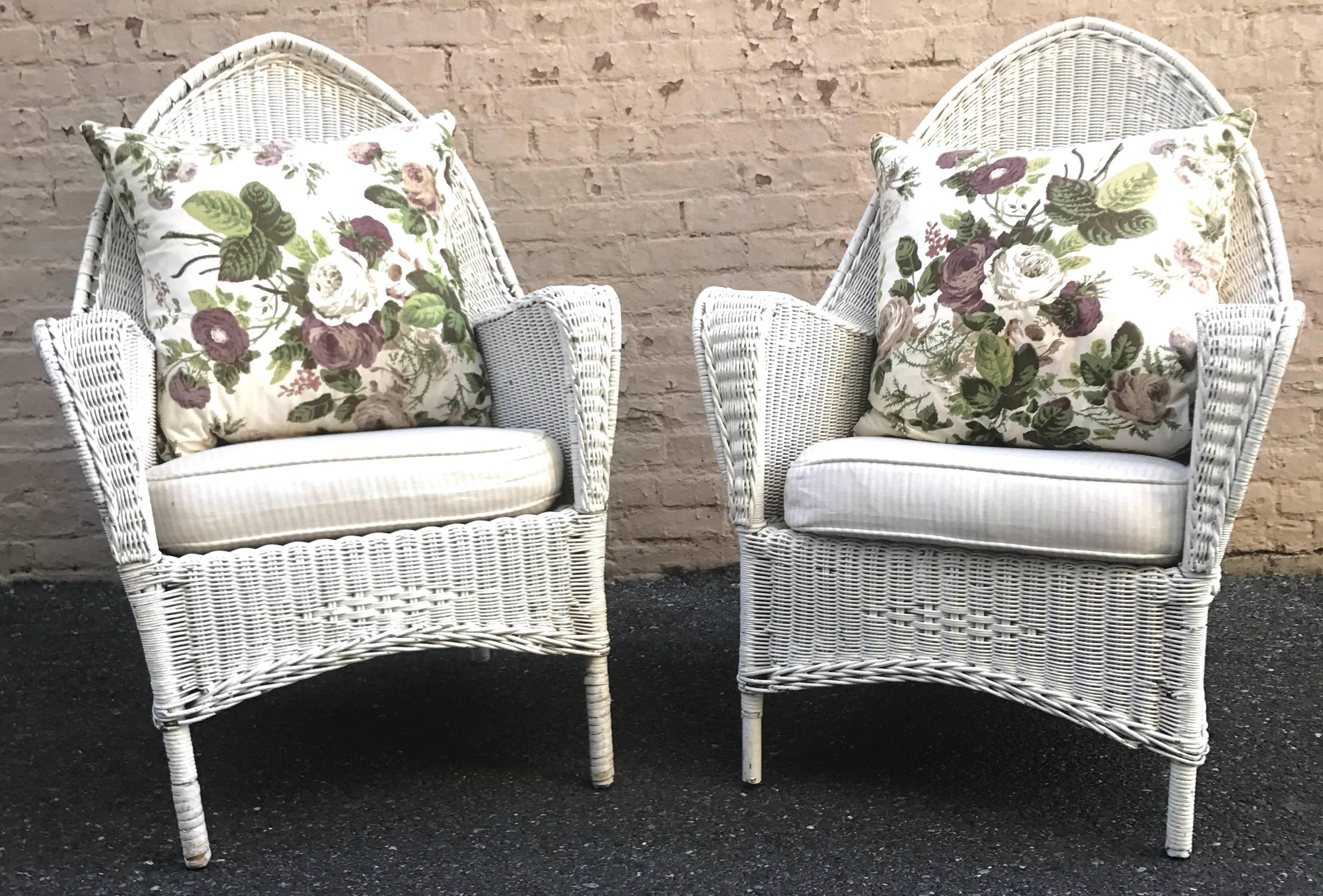 Iconic and important  pair of 1920s painted white wicker armchairs, belonging to Little and Big Edie of Grey Gardens, and displayed in the living room for over 40 years by the last owners of the home, Sally Quinn and Ben Bradlee.  