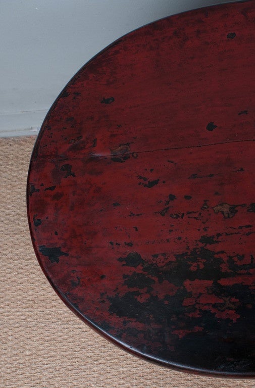 Qing dynasty pair of red lacquer two-door bedside chests with drawer. Careful conservation has retained the original lacquer finish with a compelling patina. The pair would also make excellent end tables or side tables.