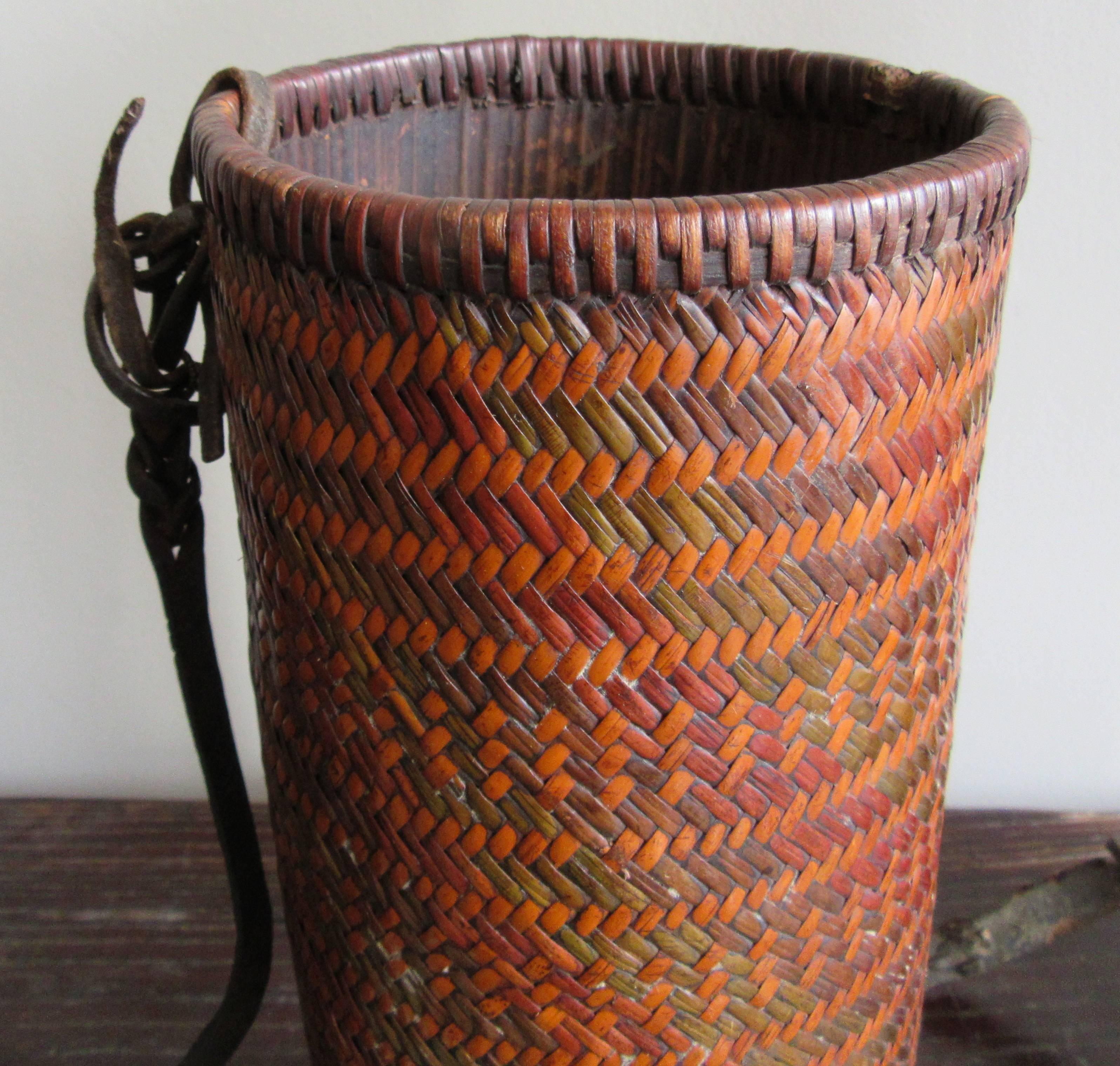 Intricately woven rattan thermos from Bhutan, each has a distinctive pattern. These thermoses were filled with barley beer and carried throughout the hills and mountains by the peasants.
