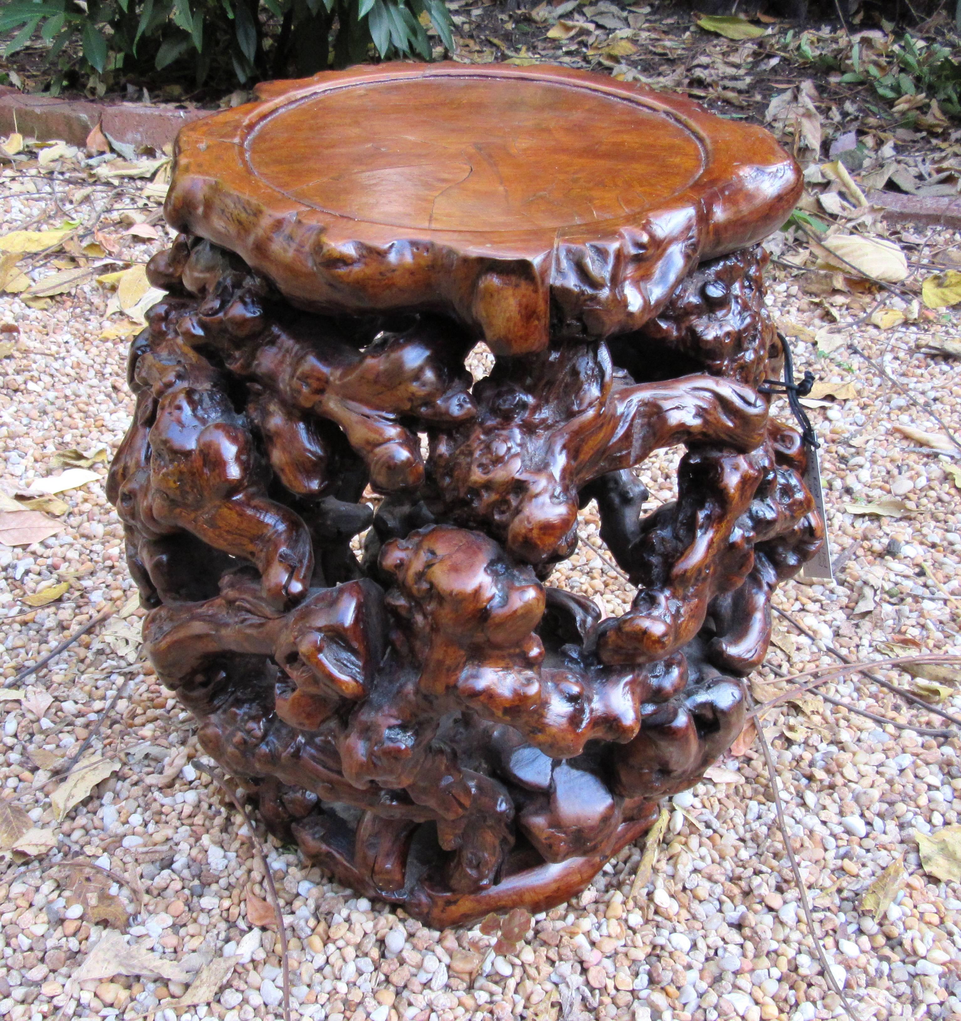 Pair of vine root constructed drum shaped stools or tables with burl wood top. Compelling depth of color and organic design.