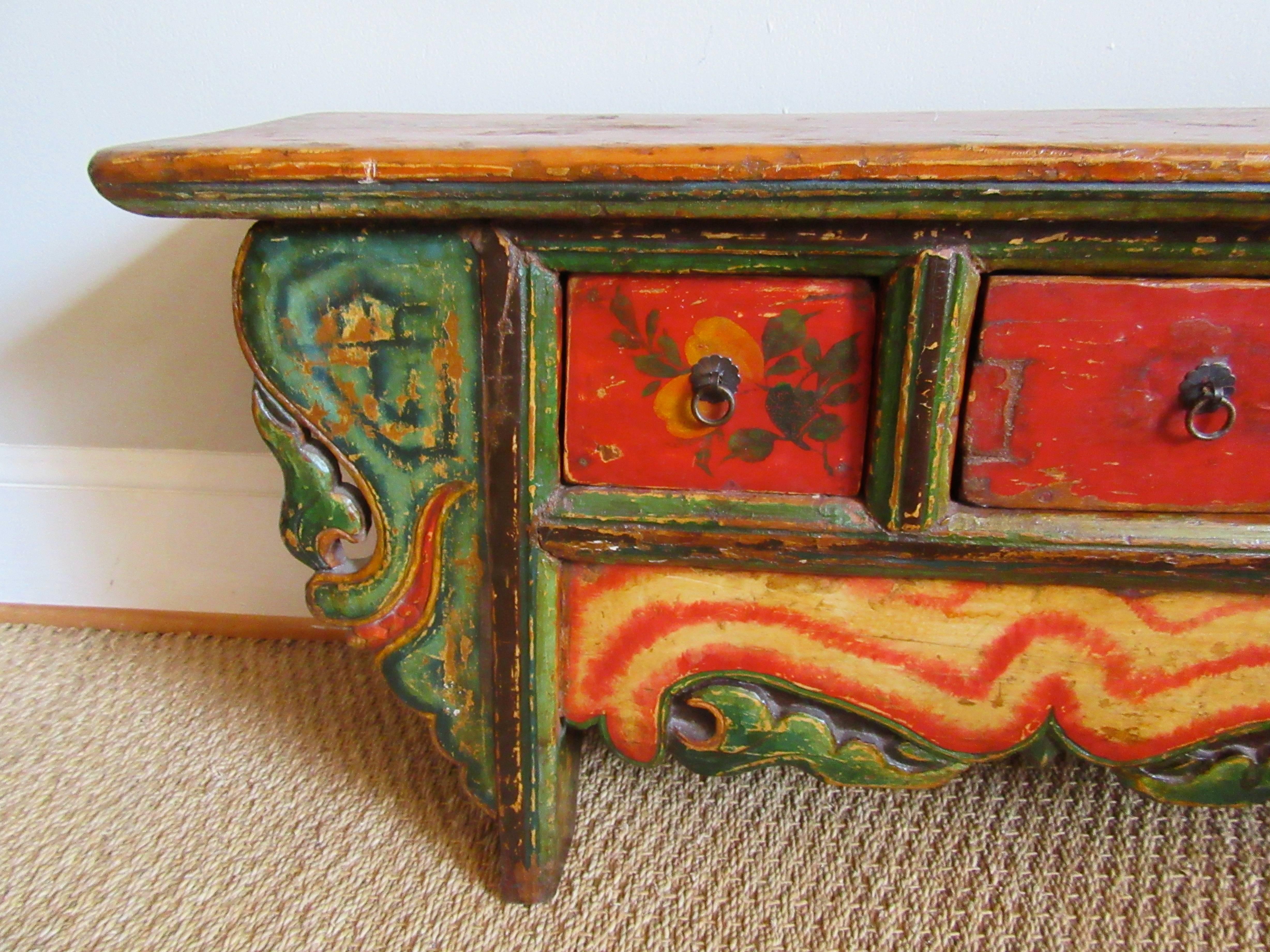 Antique Provincial hand-painted low cabinet with five small drawers. The piece is entirely handcrafted and hewn from indigenous elmwood.