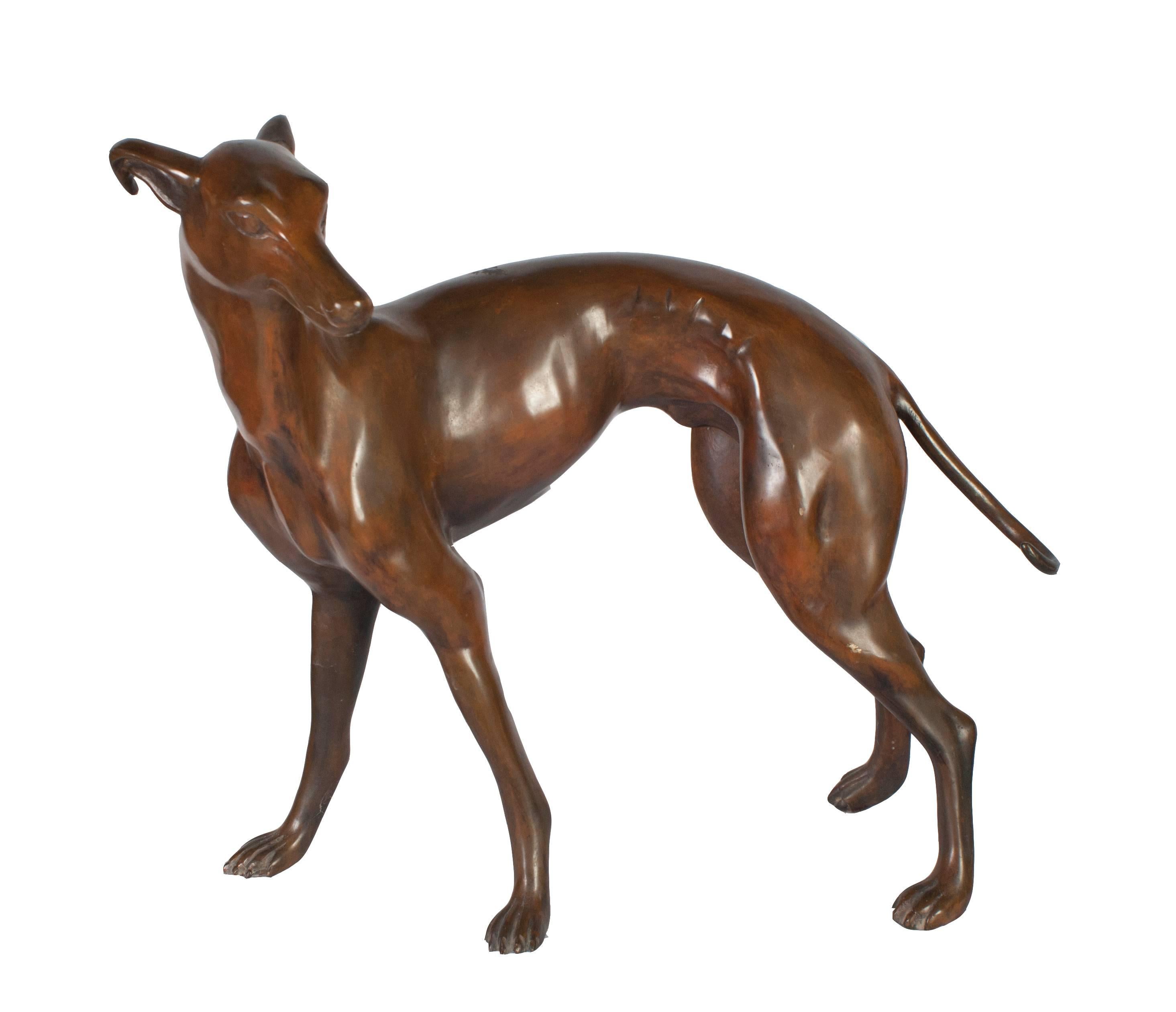 A pair of Neopolitan bronze whippets.