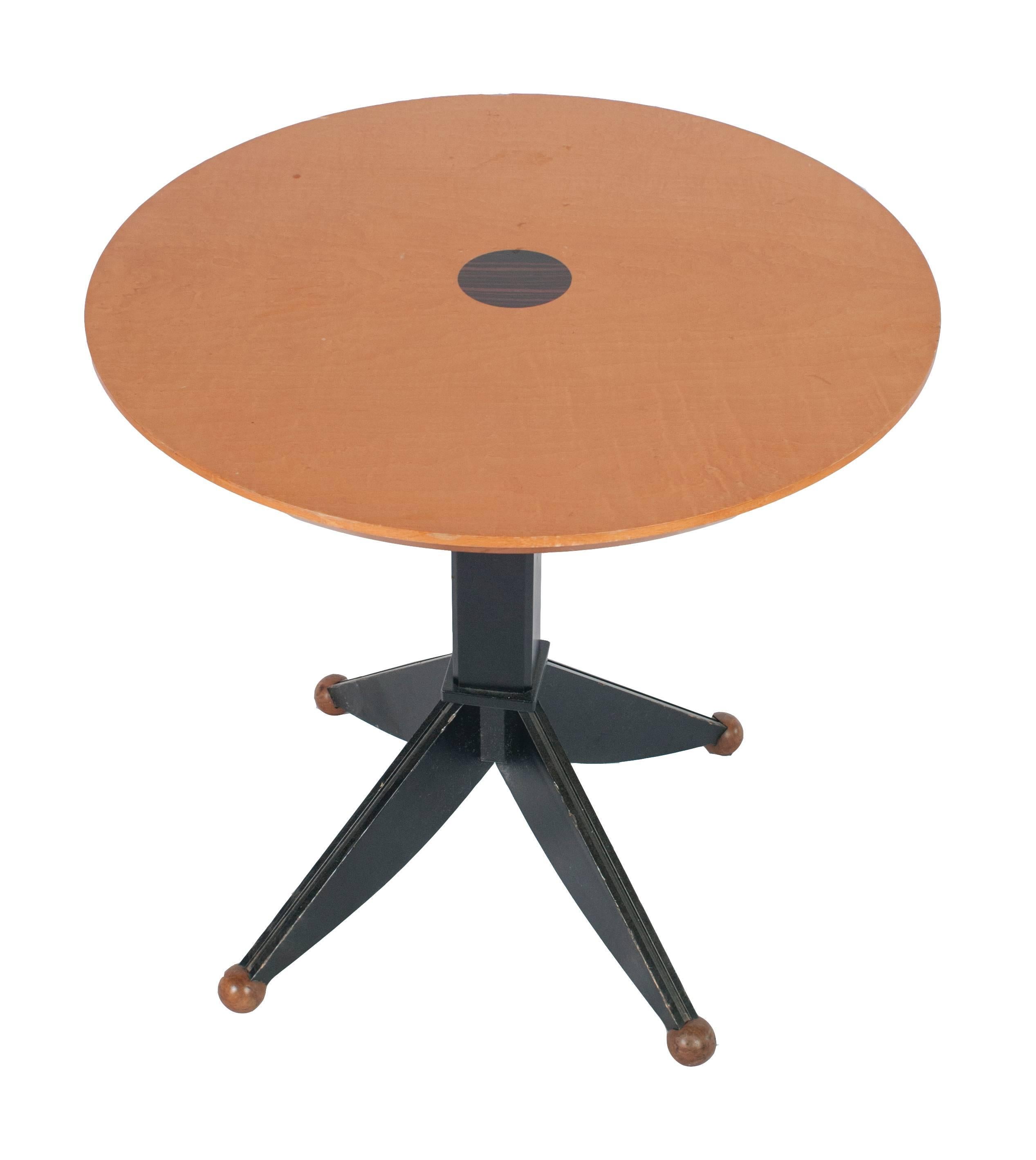 A Set of painted gueridon tables sold individually.