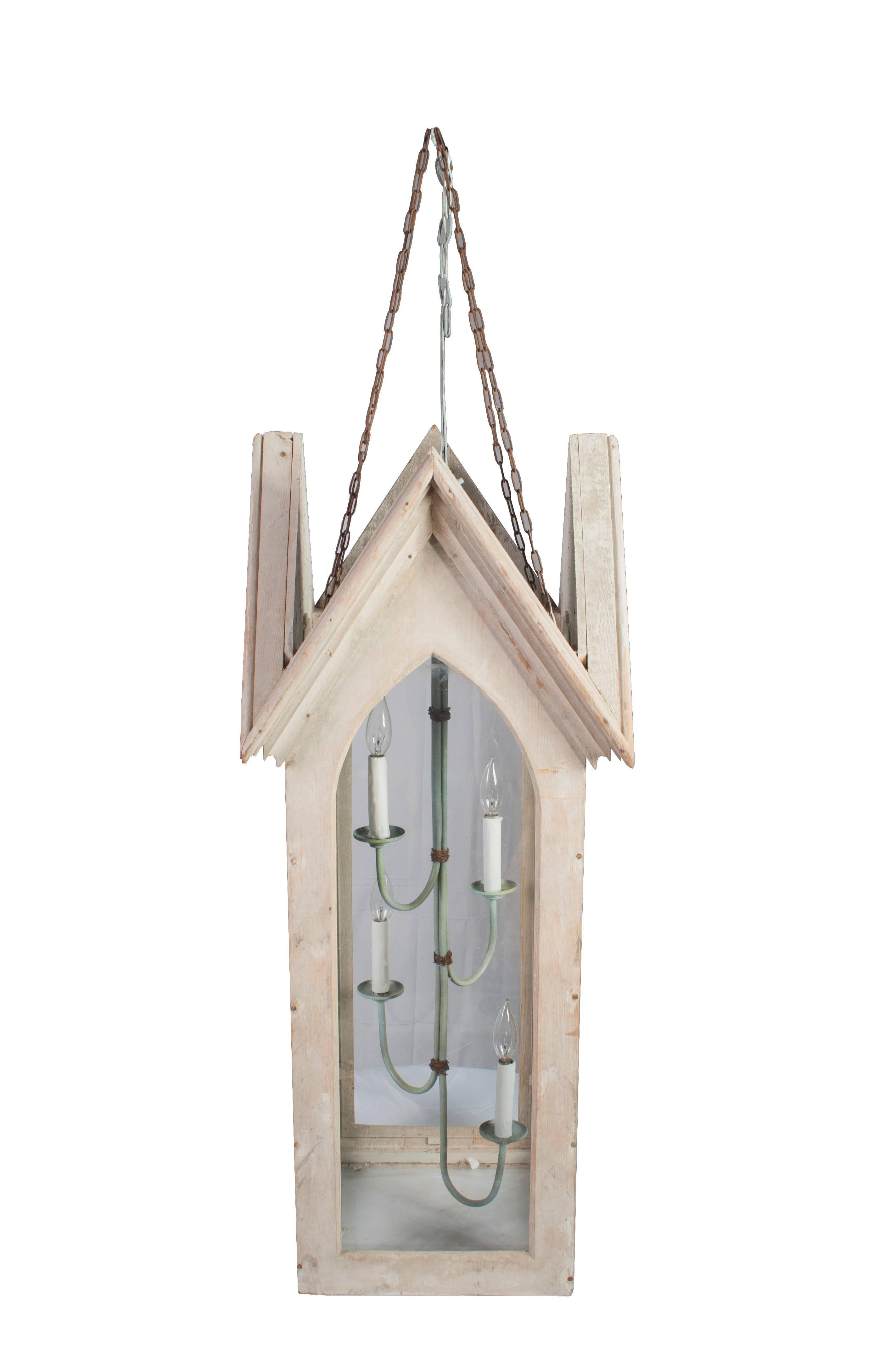 A pair of very unusual pine lime painted wooden Gothic lanterns.
Glass to either side and the bottom.