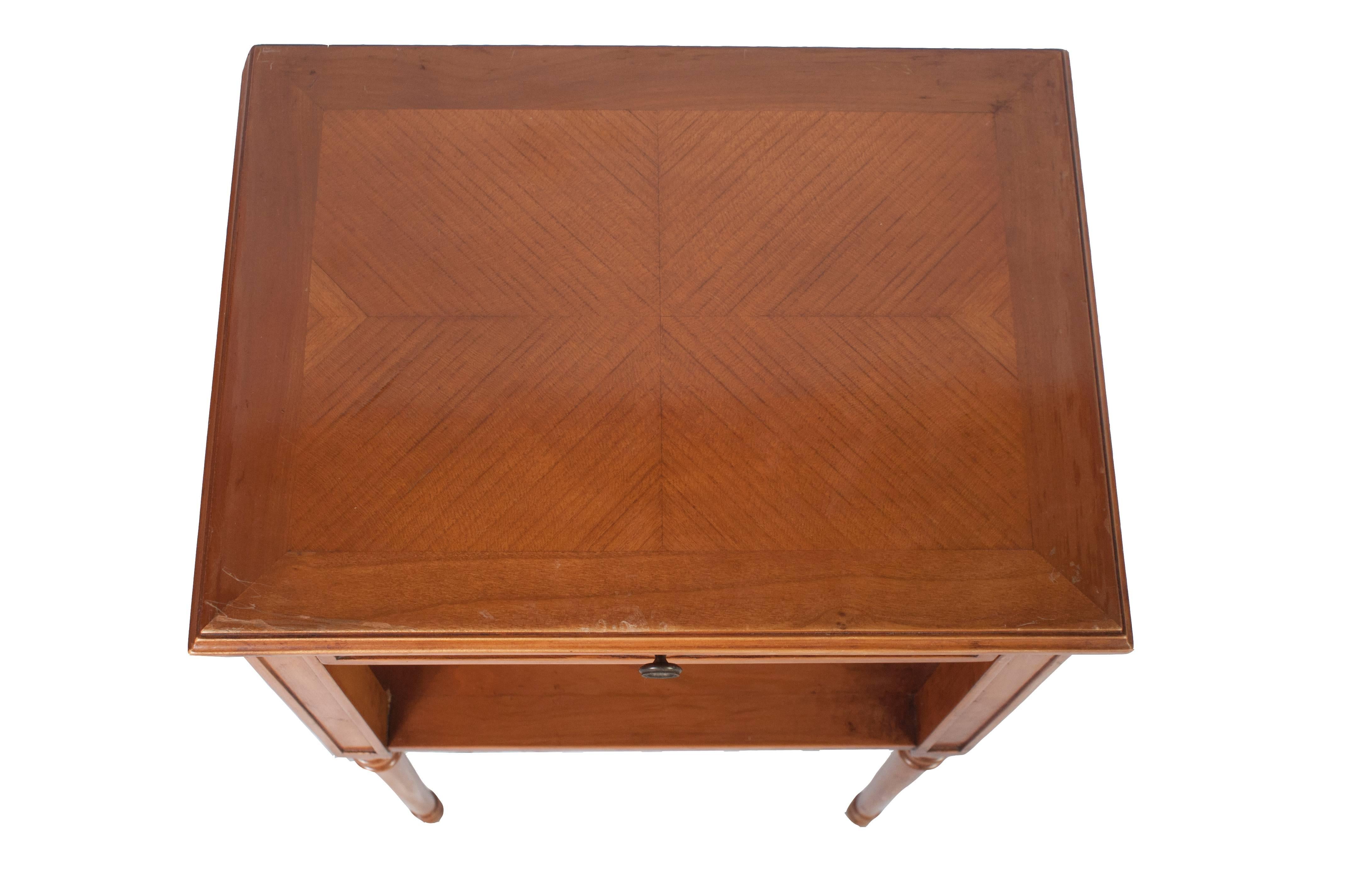 A pair of Meister (cherrywood) nightstands or side tables with drawers.