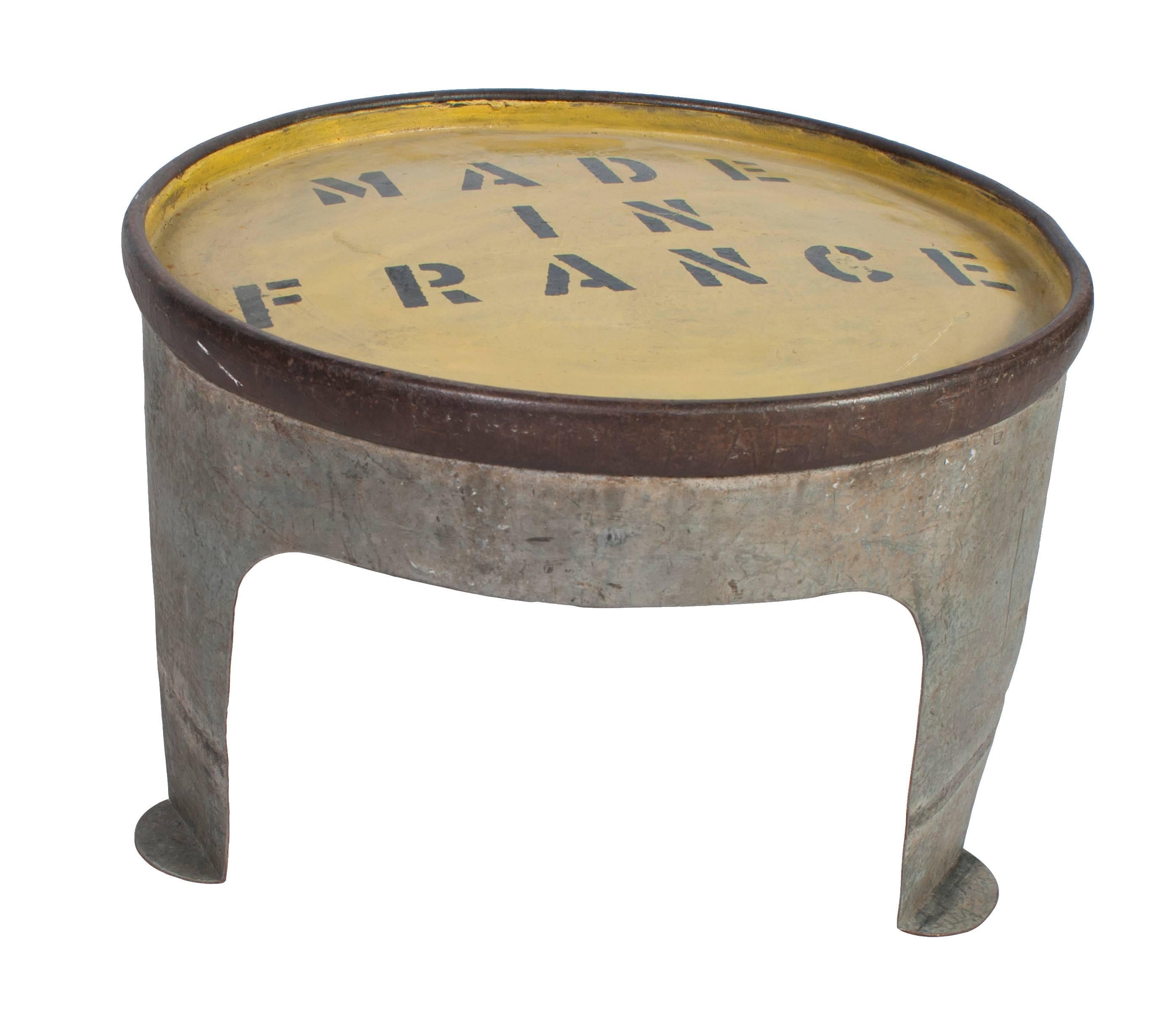 Great heavy duty round coffee table with a hand-painted yellow top.