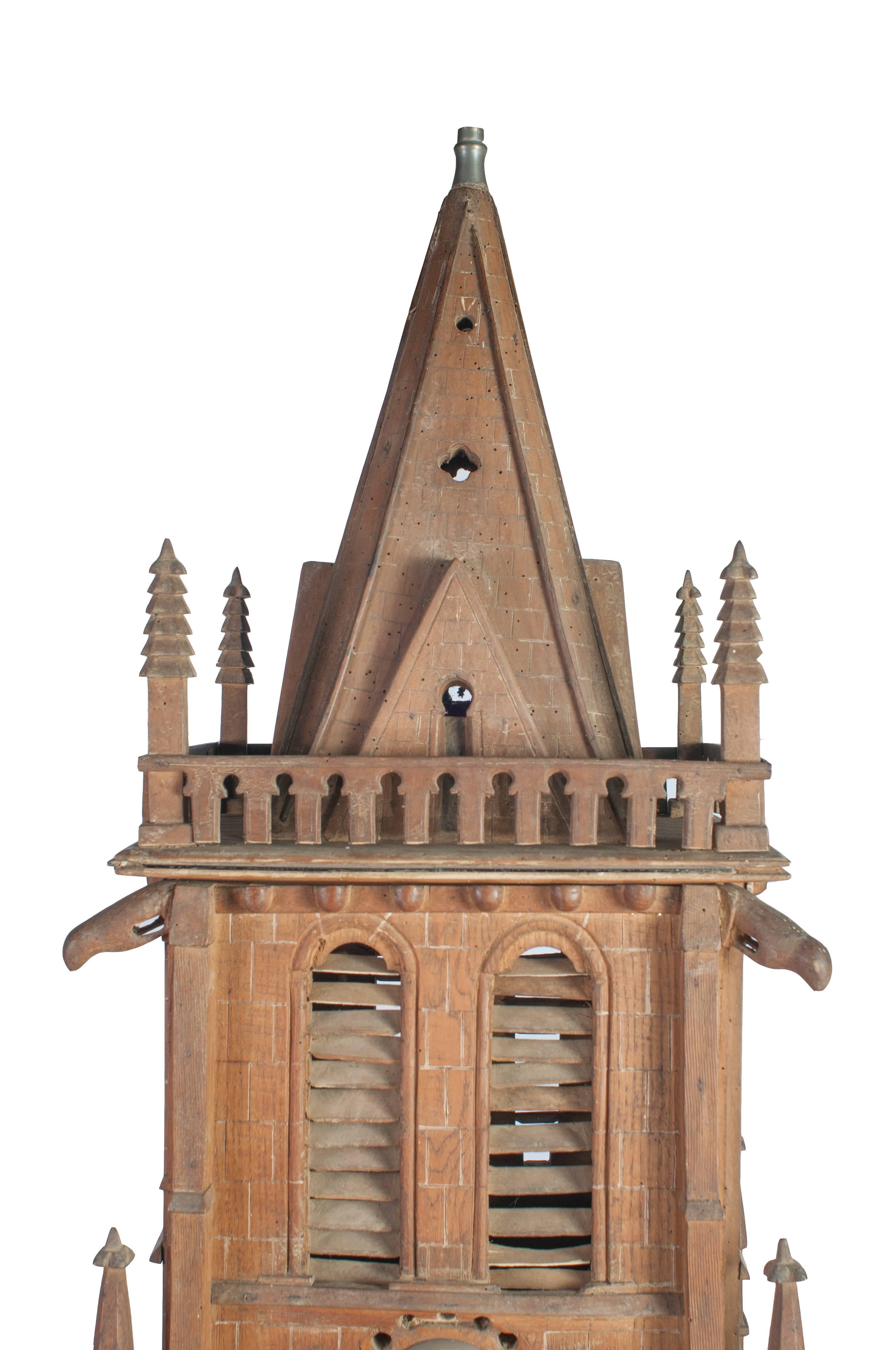 Painted miniature Normandy church. Two pieces.
The doors on the bottom level open.