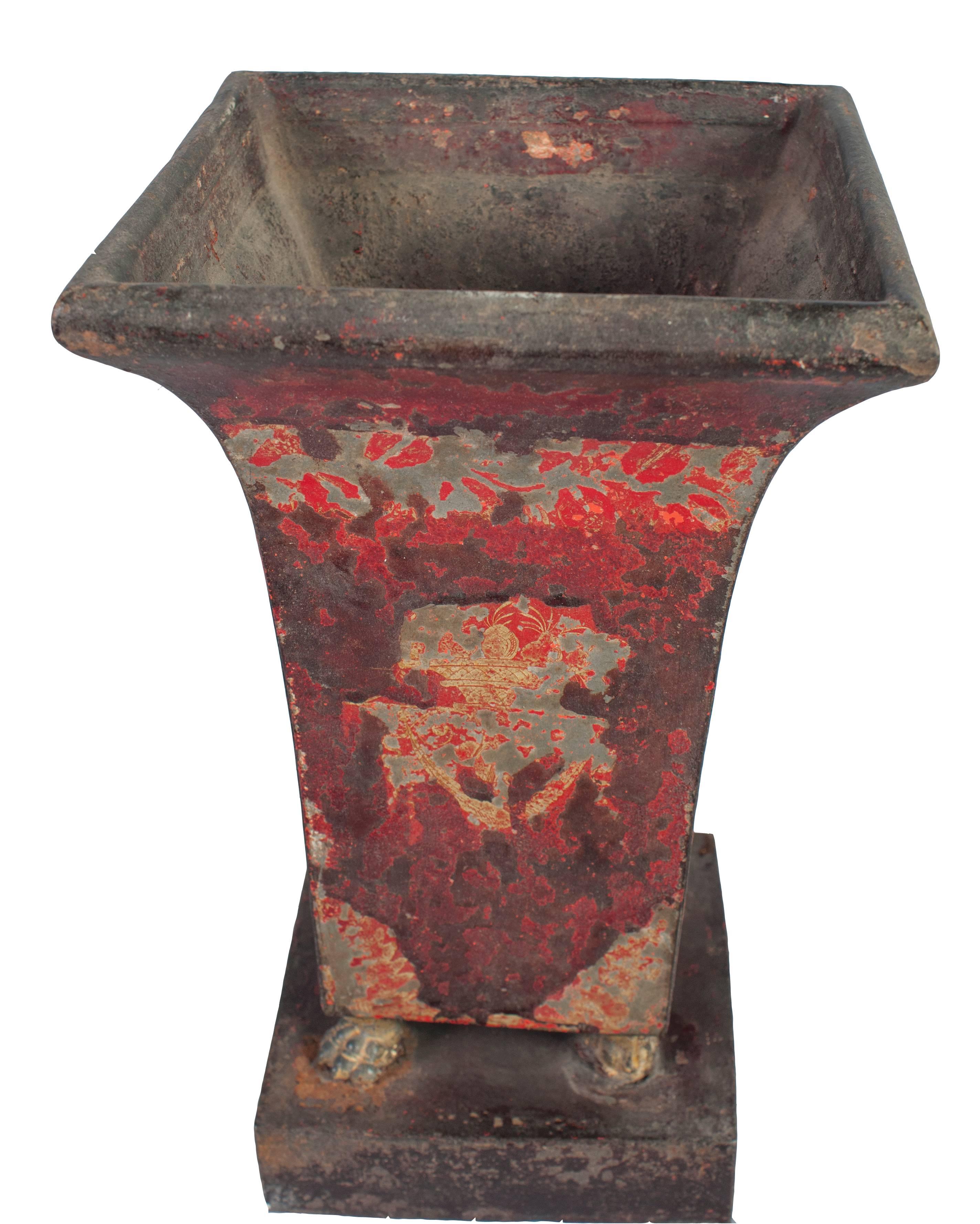 A red directoire tole vase.