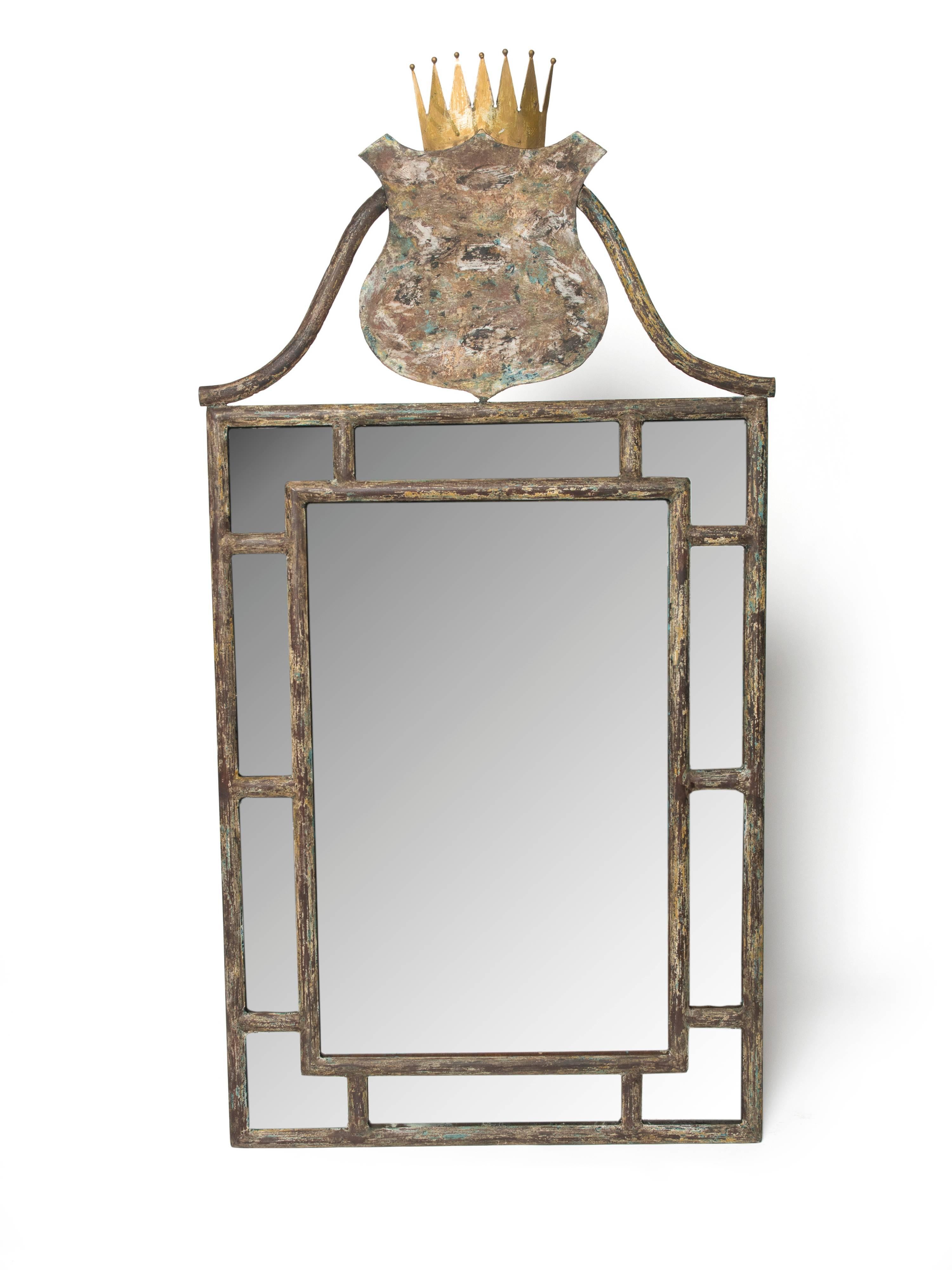 Provençal painted tole mirrors with crown decoration on the top.