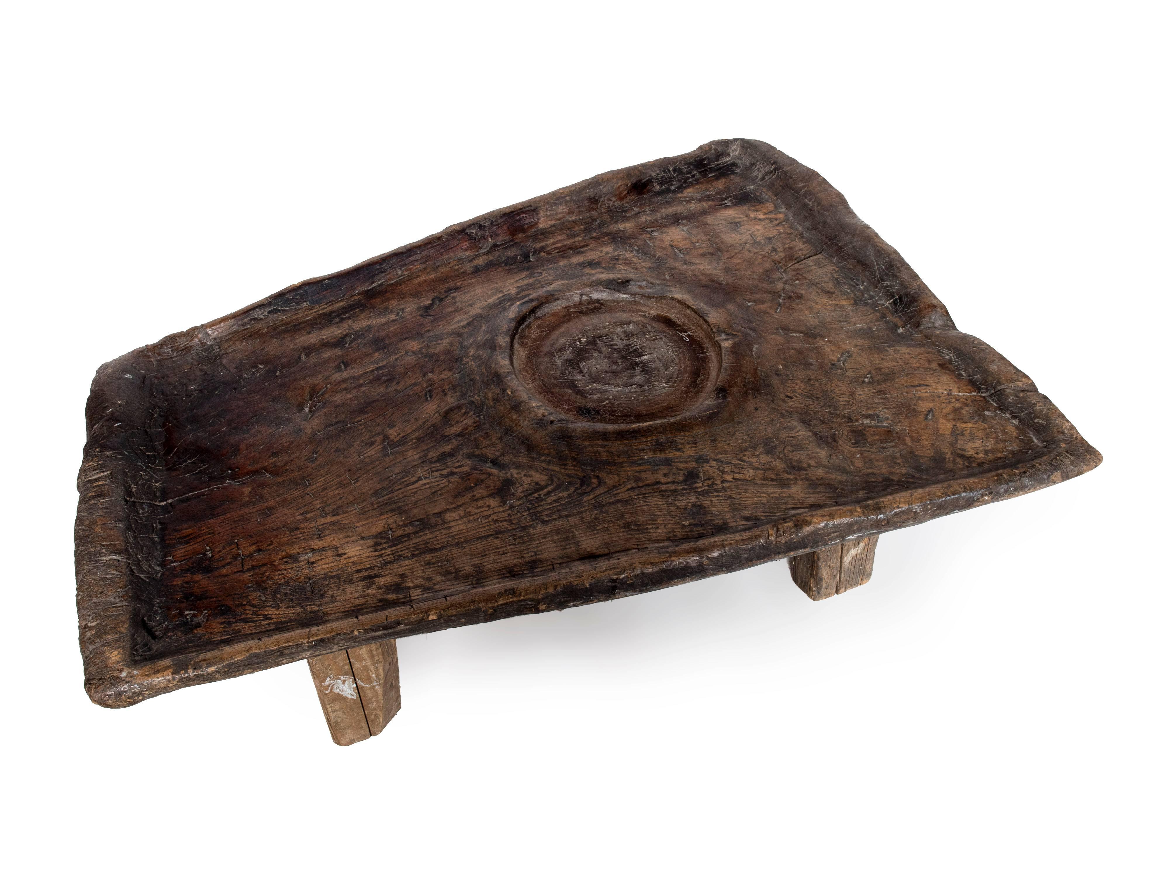 An Asian Acacia wooden coffee table.