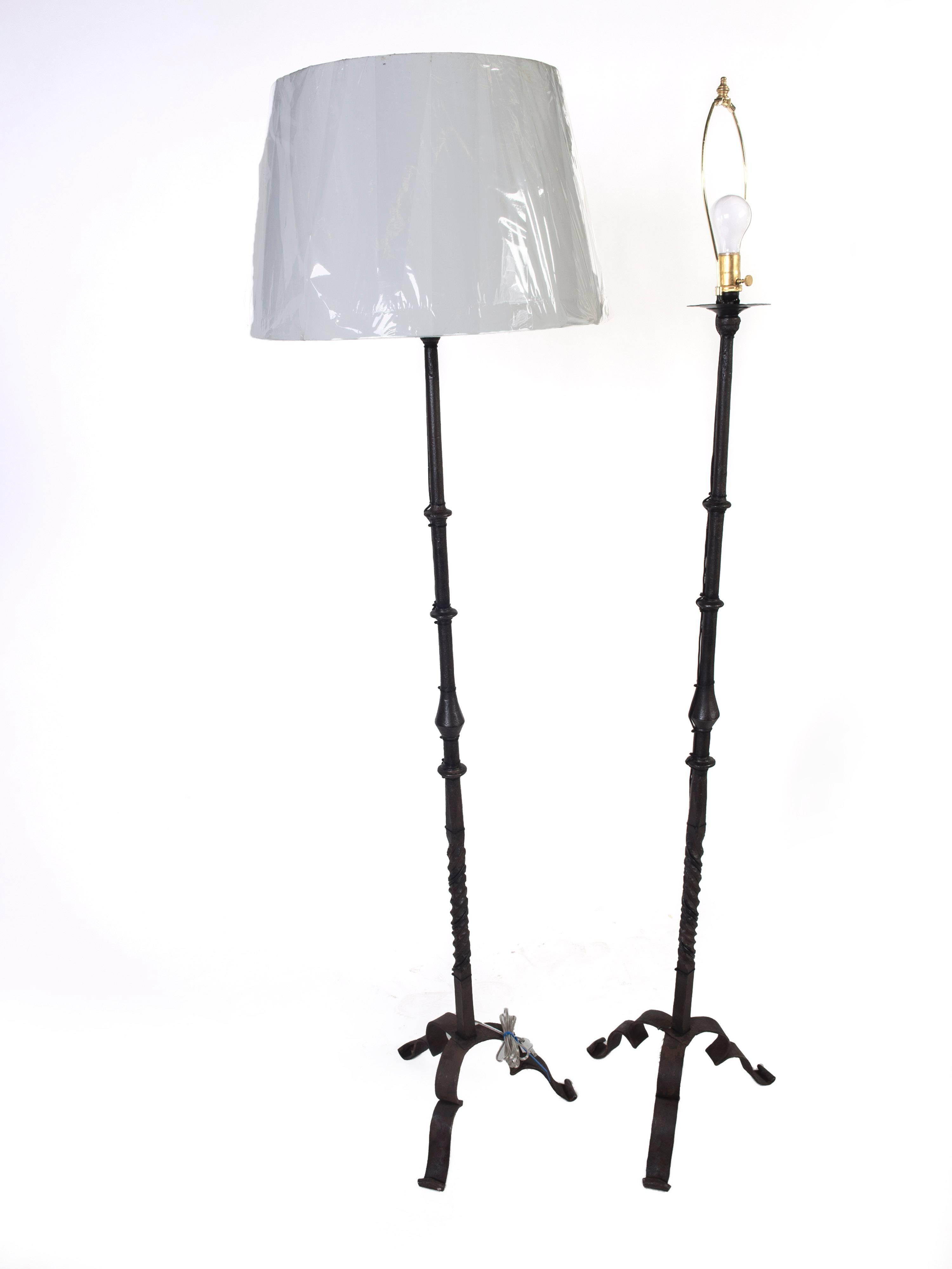 These are a very heavy duty pair of wrought iron floor lamps, the column has a candy style twist to the bottom and sits on three turned up feet.
Which measures 14 inches deep.
They have both been re wired to USA specification.
We are selling the