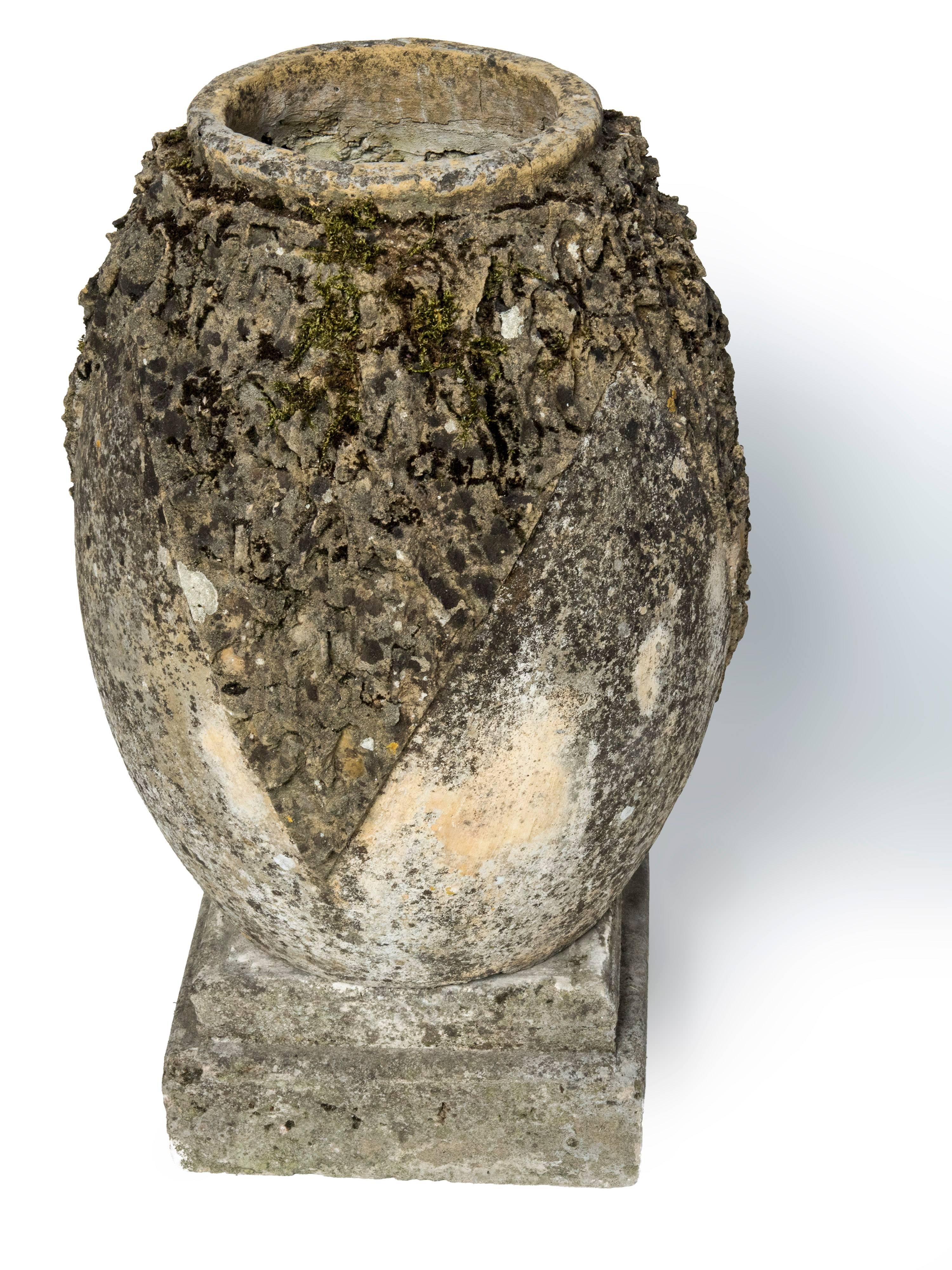 Early 20th Century Pair of Striking Cement Normandy Garden Vases with Decorated Sides