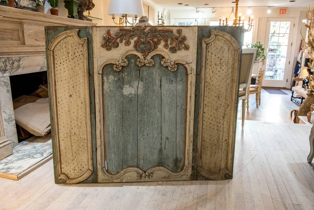 A 18th century painted boiserie panel.